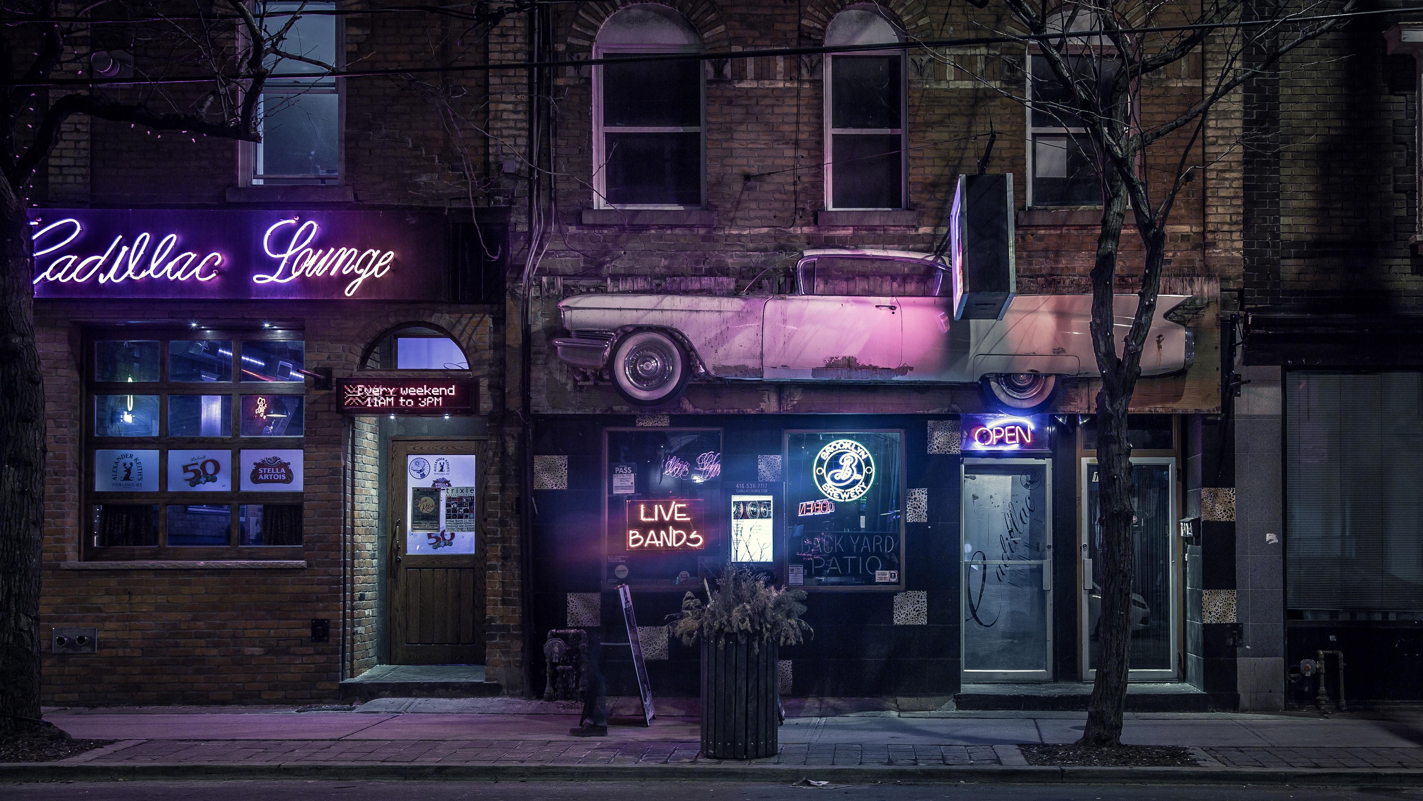 4763x2680 4763x2680 #live band, #street, #club, #storefront, #cadillac, #Creative Commons image, #shop, #city, #sign, #purple, #glow, #night, #city street, #bar, #queen, #light, #pub, #building, #live music, #wall, # neon. Mocah HD Wallpaper