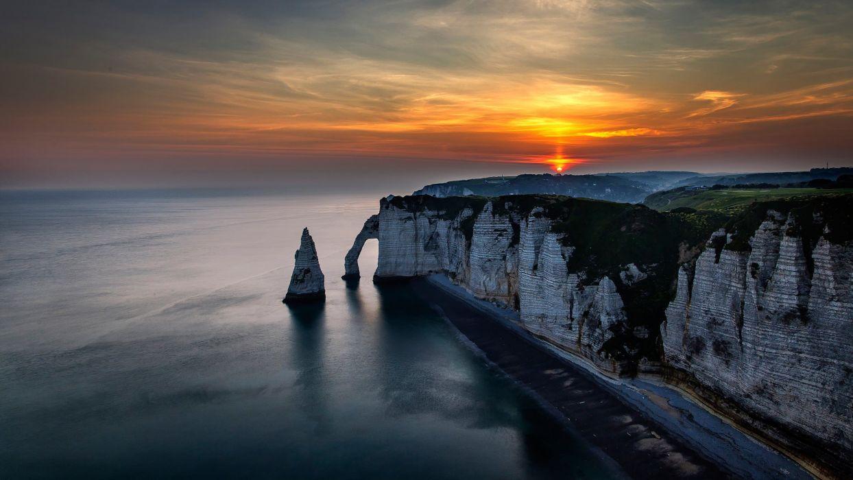 1244x700 France landscape night sunset sky clouds sun rocks beach sea nature