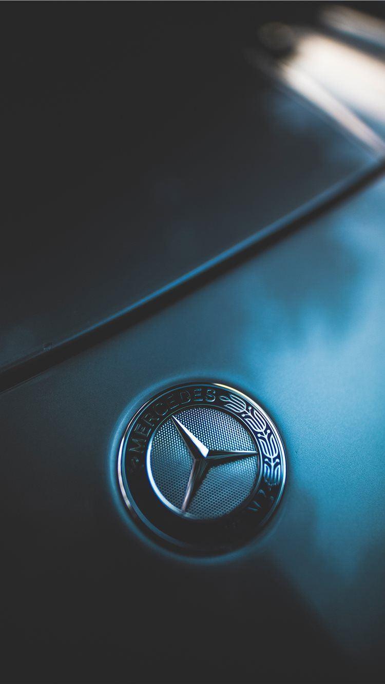 750x1334 closeup photo of Mercedes Benz emblem iPhone 8 Wallpaper Free Download
