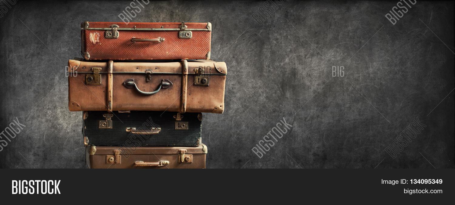 1500x675 Vintage Pile Ancient Suitcases Design Concept Travel image &. 134095349