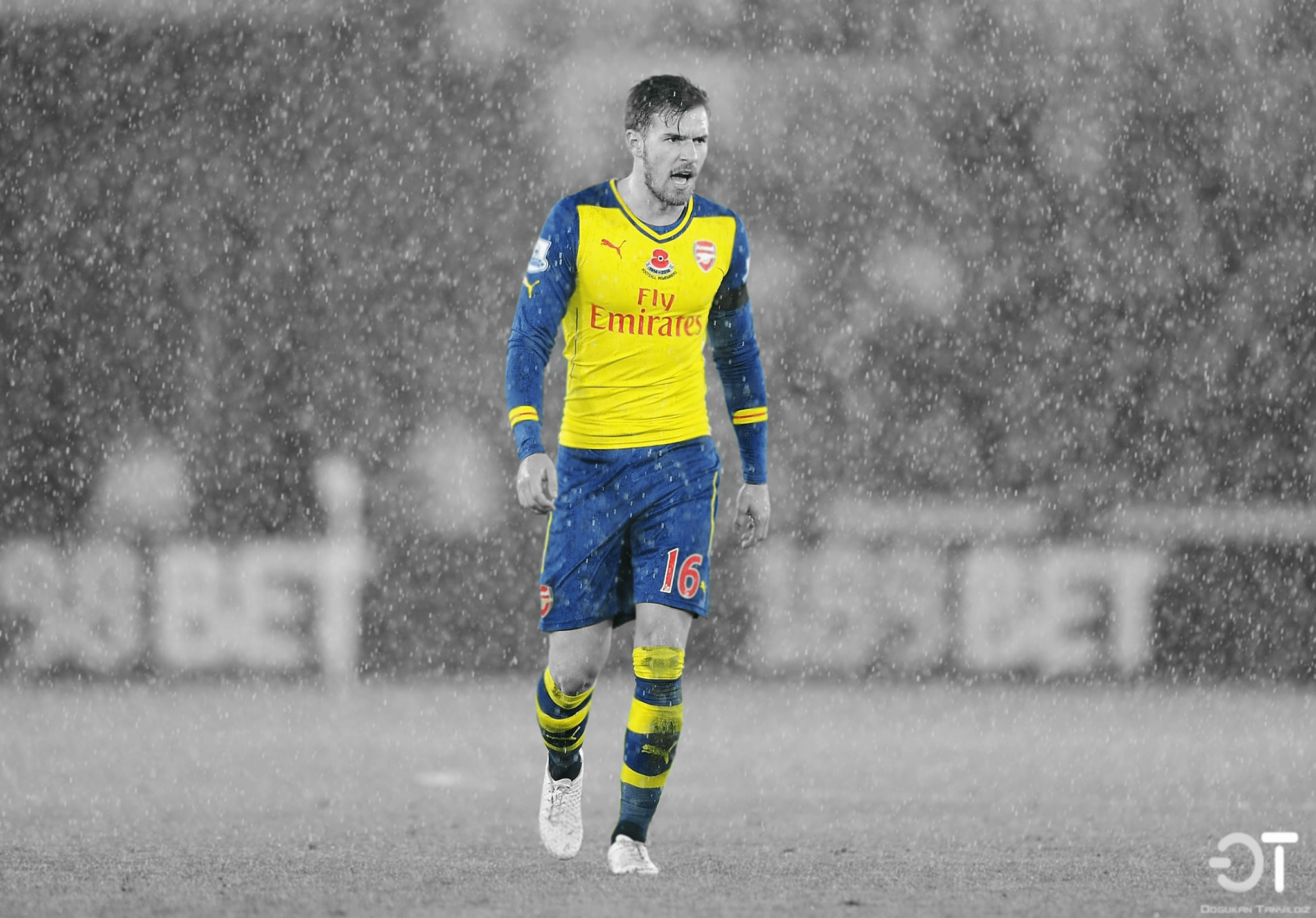 2048x1428 Football In Rain Wallpaper