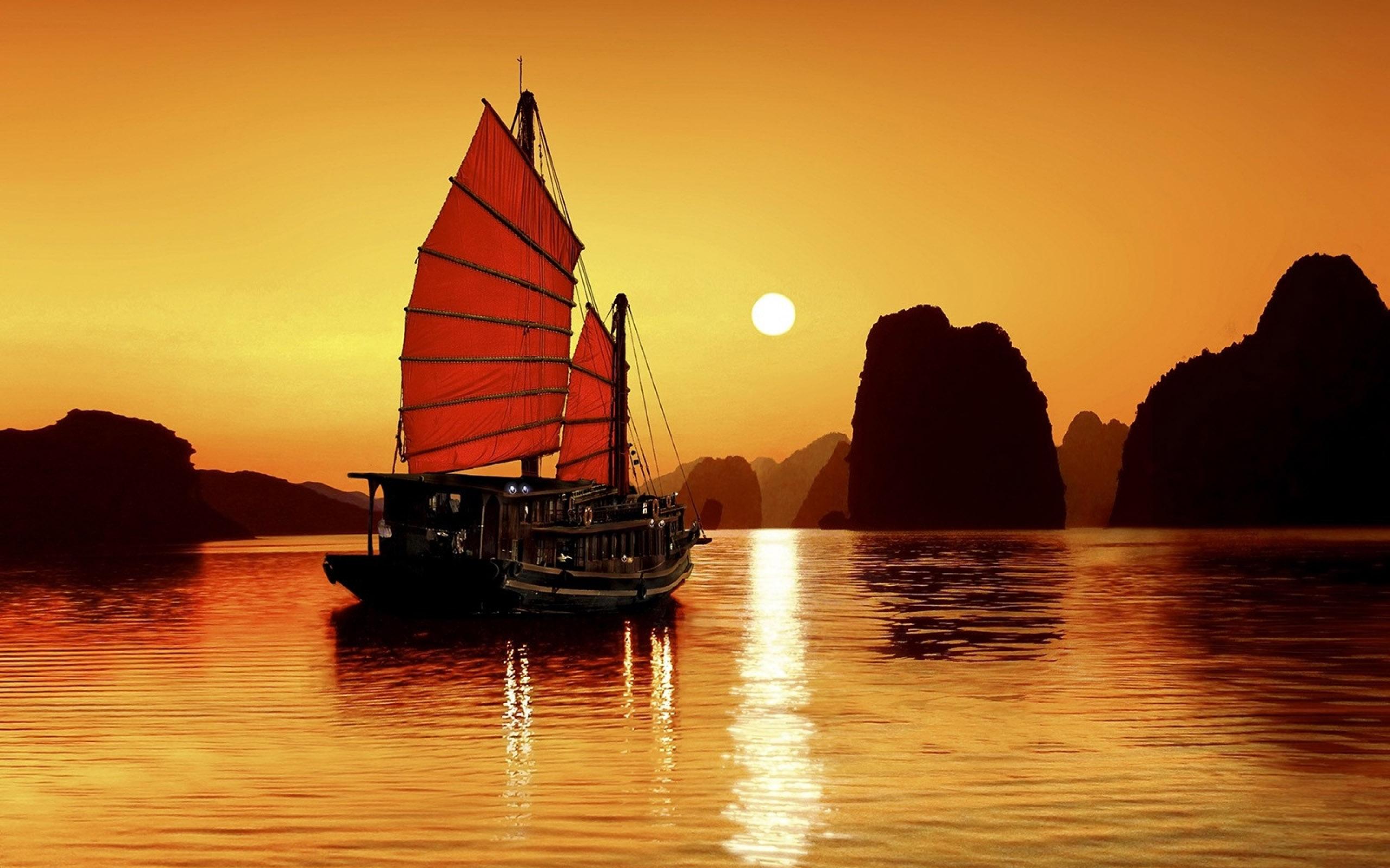 2560x1600 Boat At Sunrise In Ha Long Bay Vietnam Wallpaper