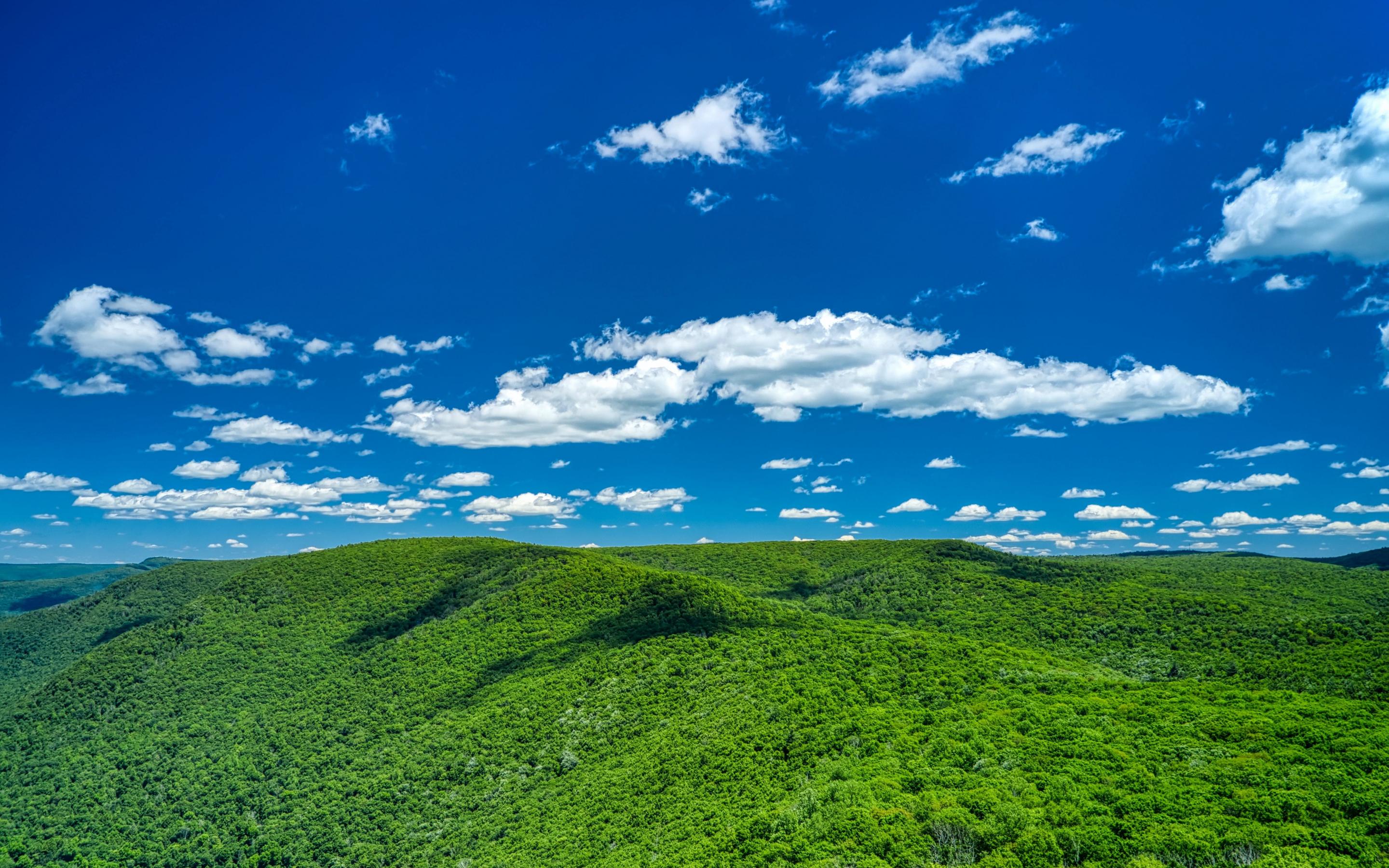 2880x1800 Download 2880x1800 wallpaper hills, landscape, white clouds, sunny sky, mac pro retaia image, background, 25149