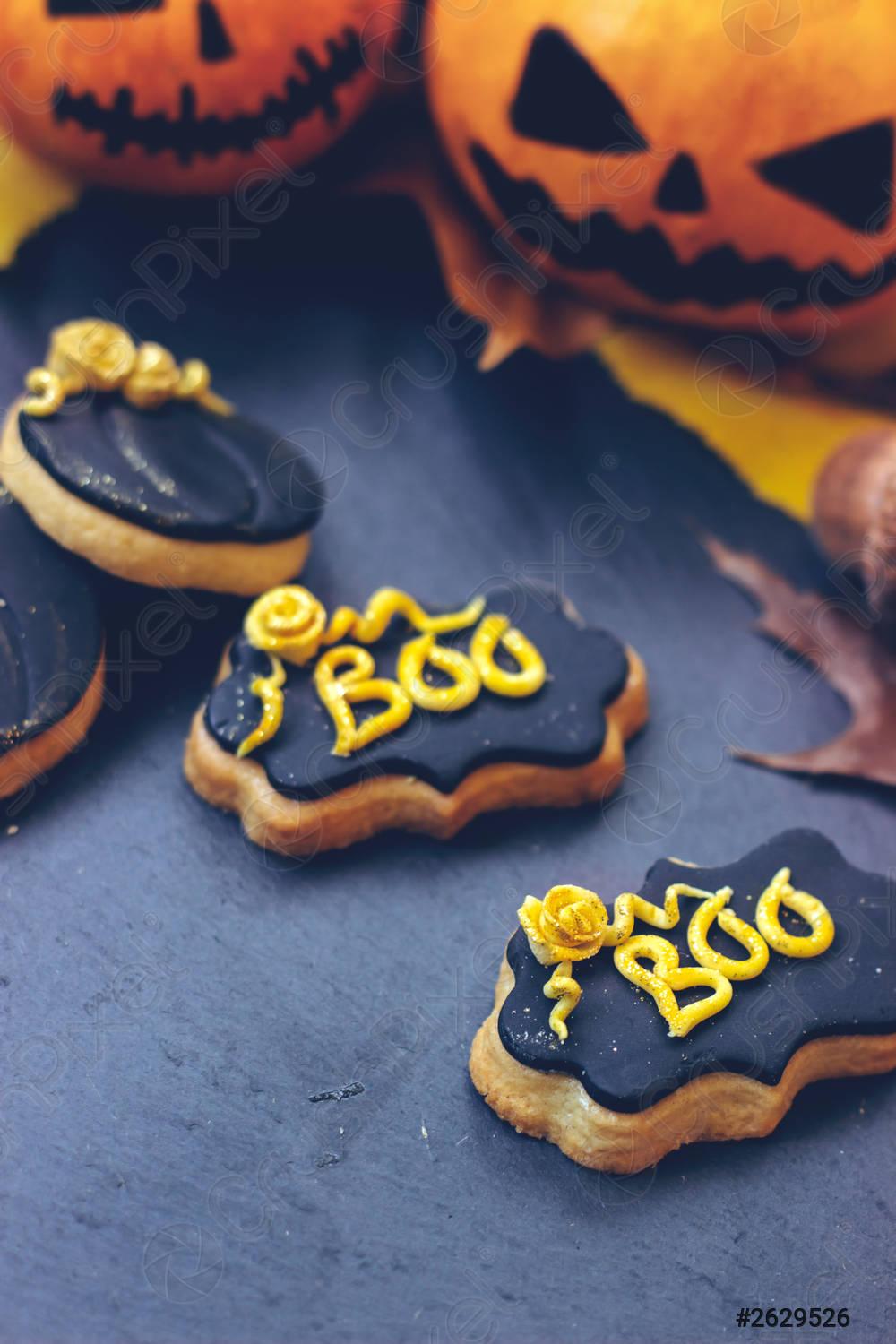 1000x1500 Halloween gingerbread cookies on dark background, with halloween mini pumpkins