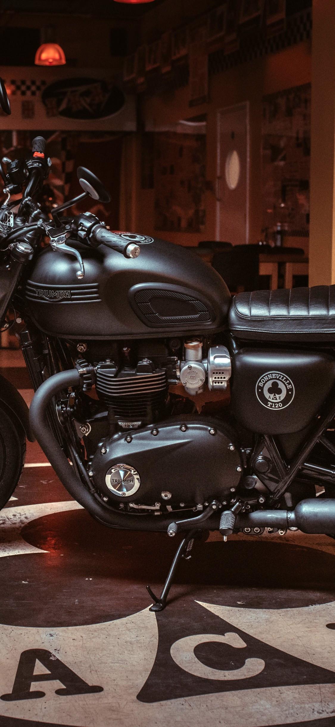 1125x2436 Download 1125x2436 Triumph Bonneville T120 Ace, Side View, Motorcycle, Room Wallpaper for iPhone 11 Pro & X
