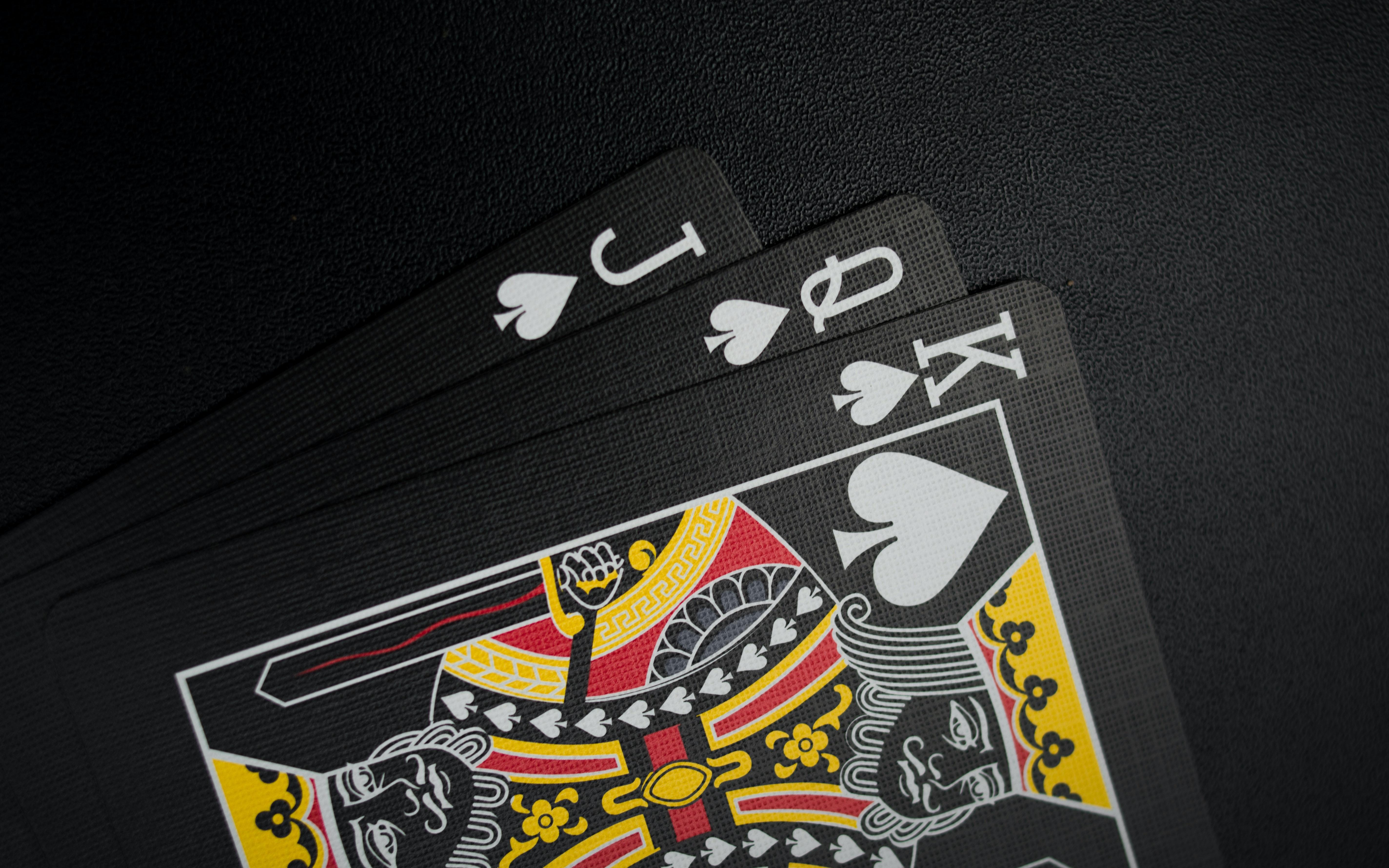 5696x3560 Black Playing Cards on Black Background · Free