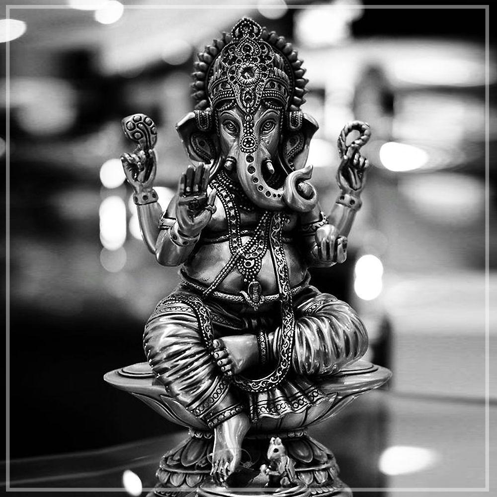 Closeup Shot Of A Miniature Ganesha Statue On The Black Background Stock  Photo - Download Image Now - iStock