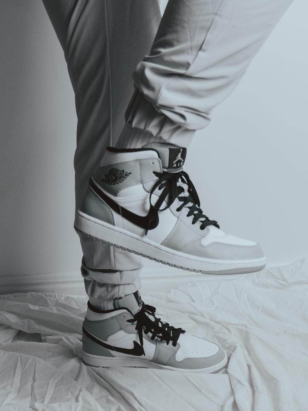 1000x1333 black white and red nike air jordan 1 shoe photo
