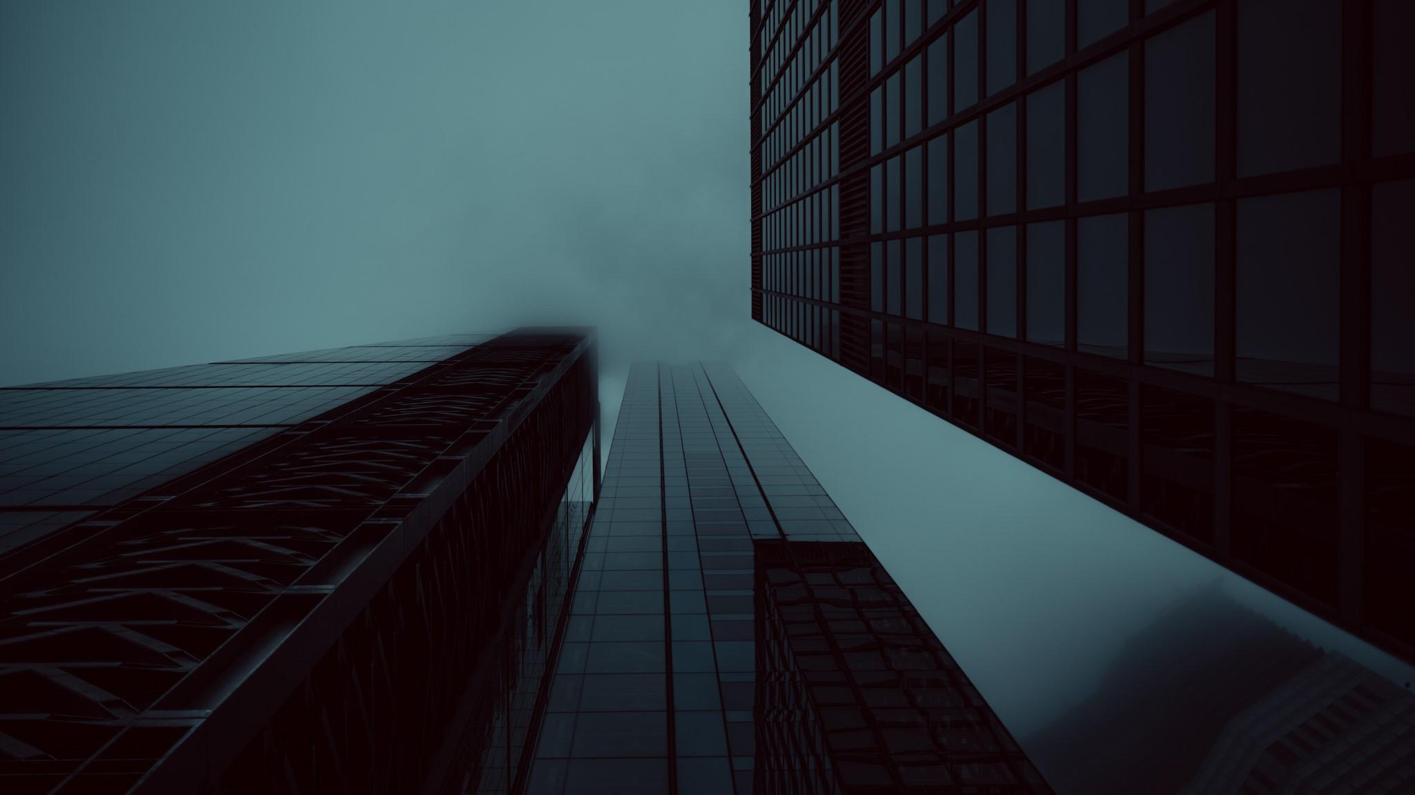 2048x1152 Wallpaper / building, night, dark, mist, skyscraper, bottom view