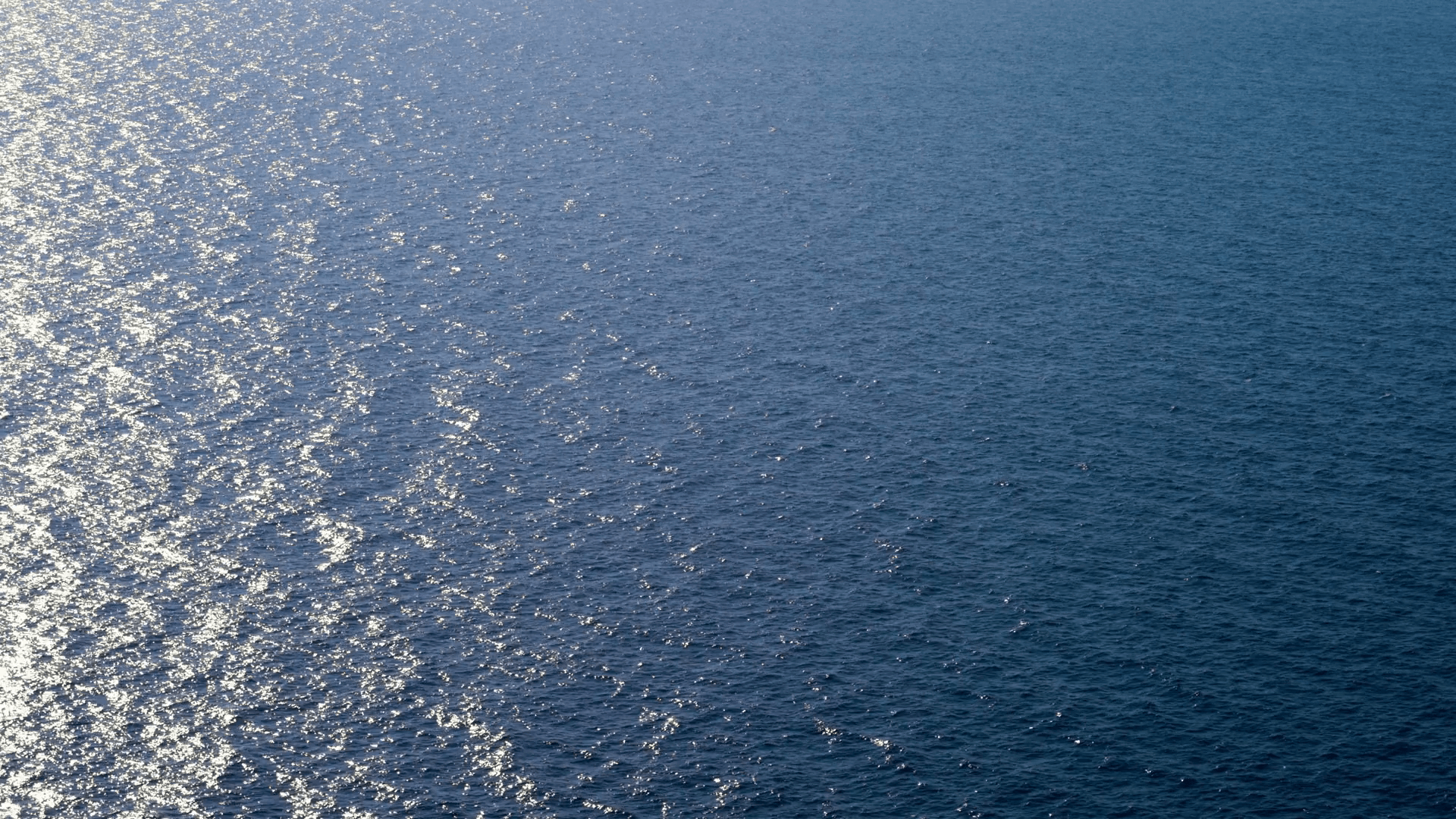 1920x1080 Wallpaper water surface rippled simple background deep blue