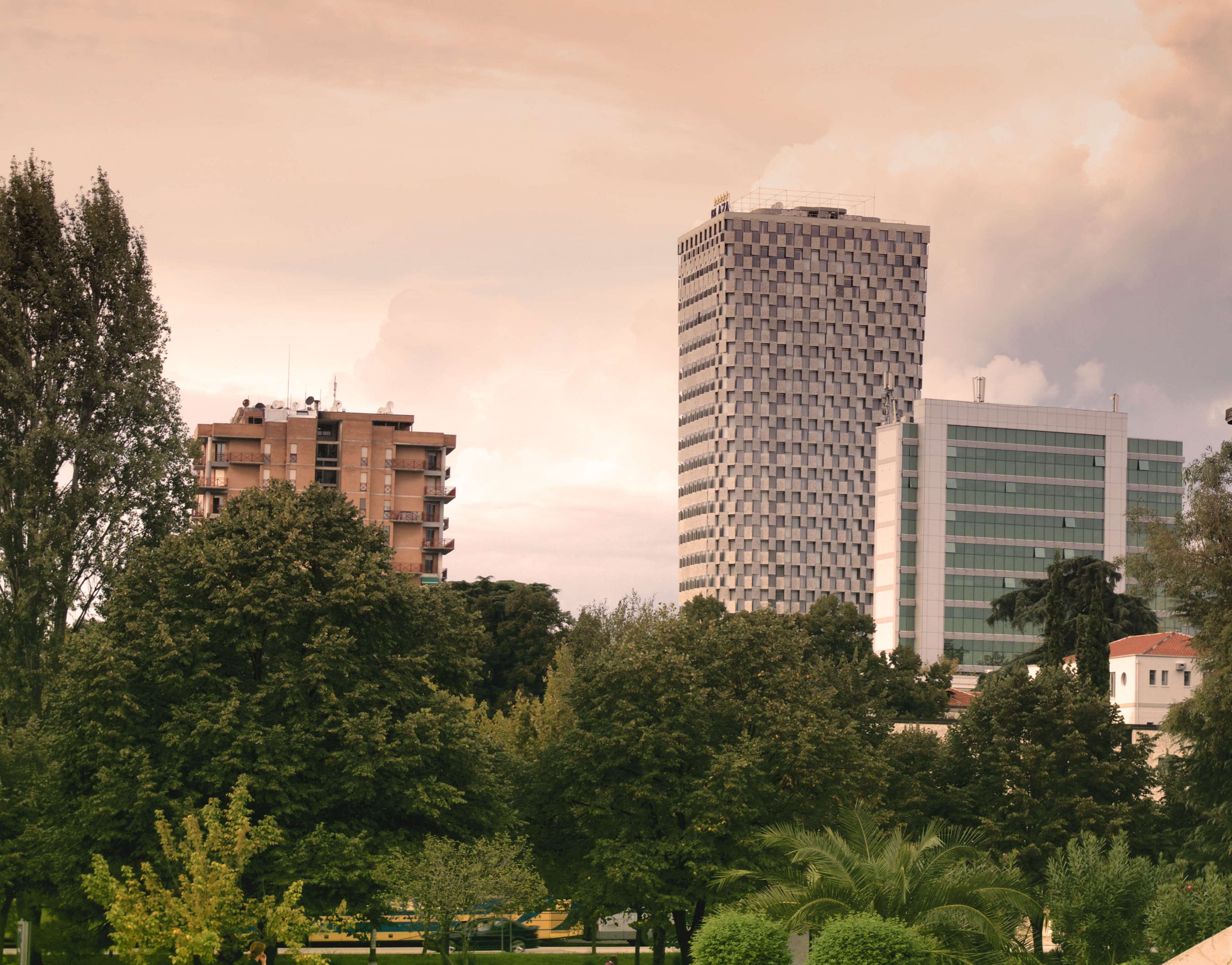 3840x3011 albania, architecture, buildings, business, city, coconut trees, daylight, downtown, modern, outdoors, park, skyscraper, tirana, tower, travel, urban 4k wallpaper