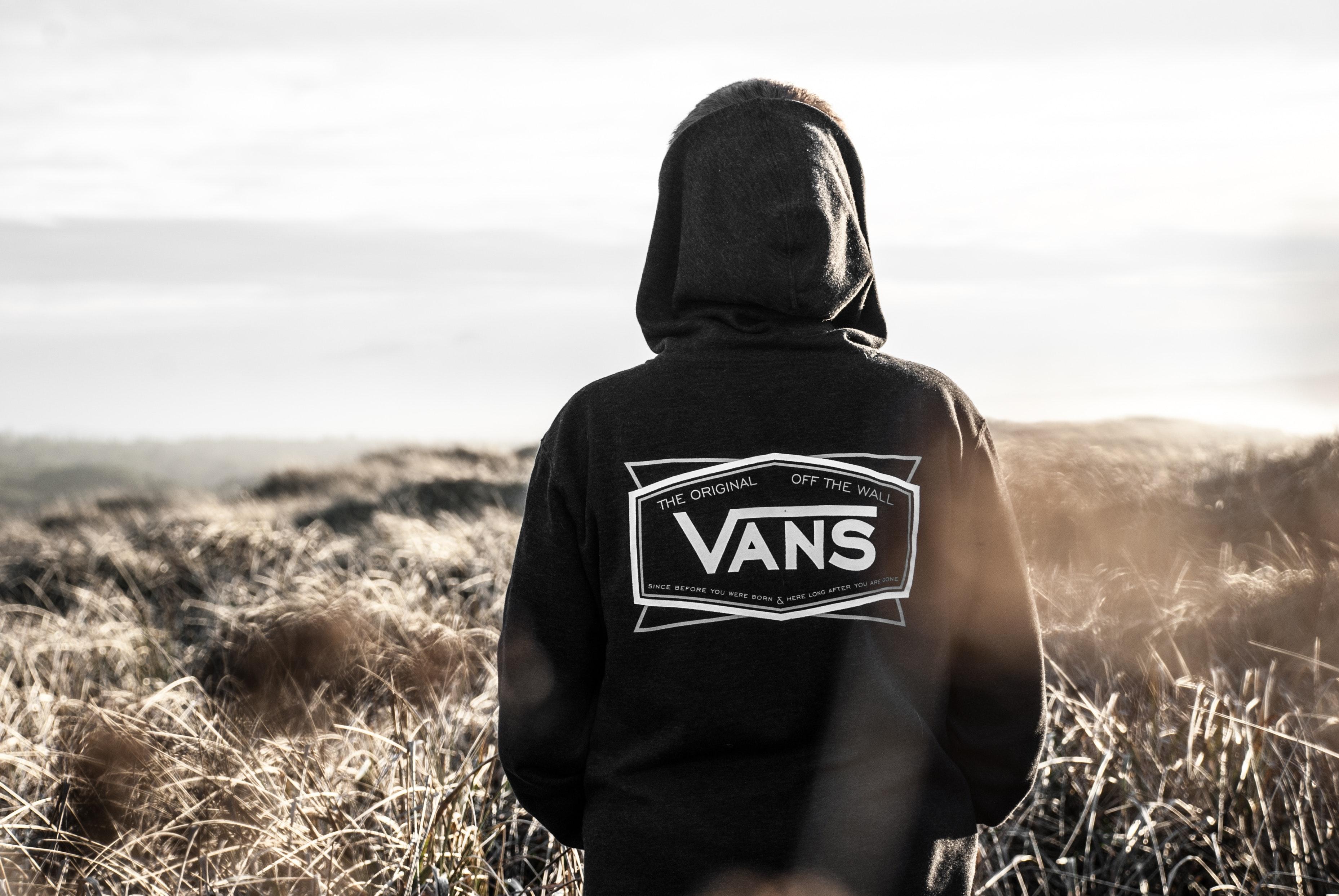 3715x2487 Photo Of Person Wearing Black Vans Hoodie · Free
