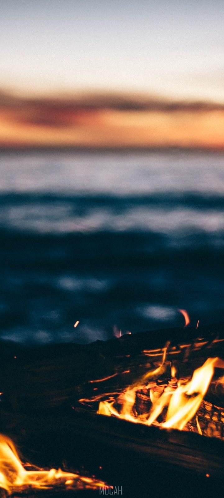 720x1600 a fire at the ocean, vivo Y20 wallpaper HD download, 720x1600. Mocah HD Wallpaper