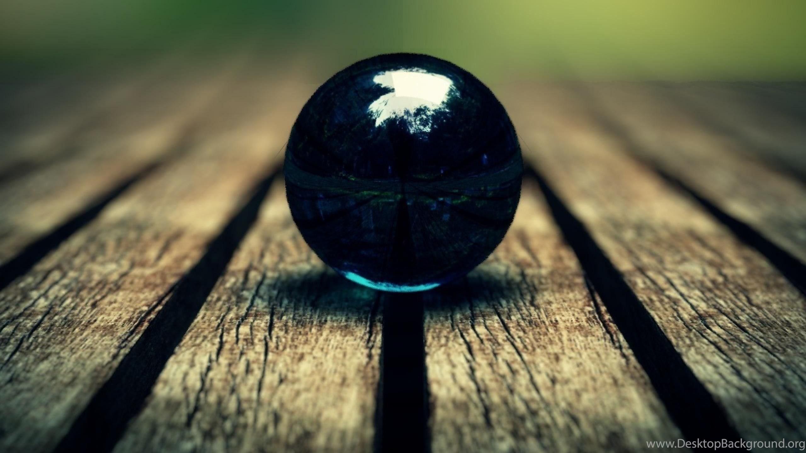 2560x1440 Blue Nature Wood Balls Focus Globes Deck Marble Globe Wallpaper. Desktop Background