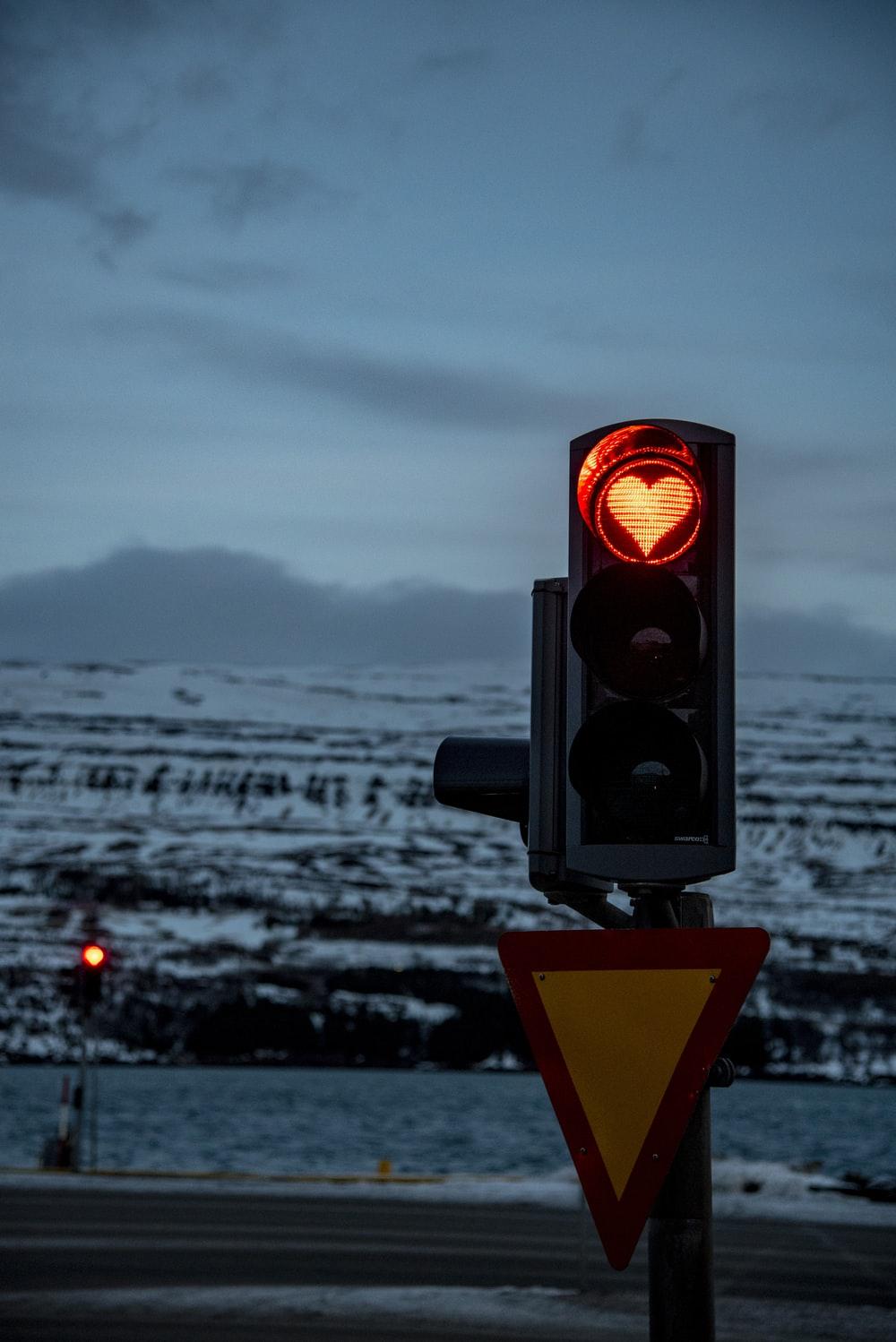 1000x1498 traffic light displaying orange heart photo