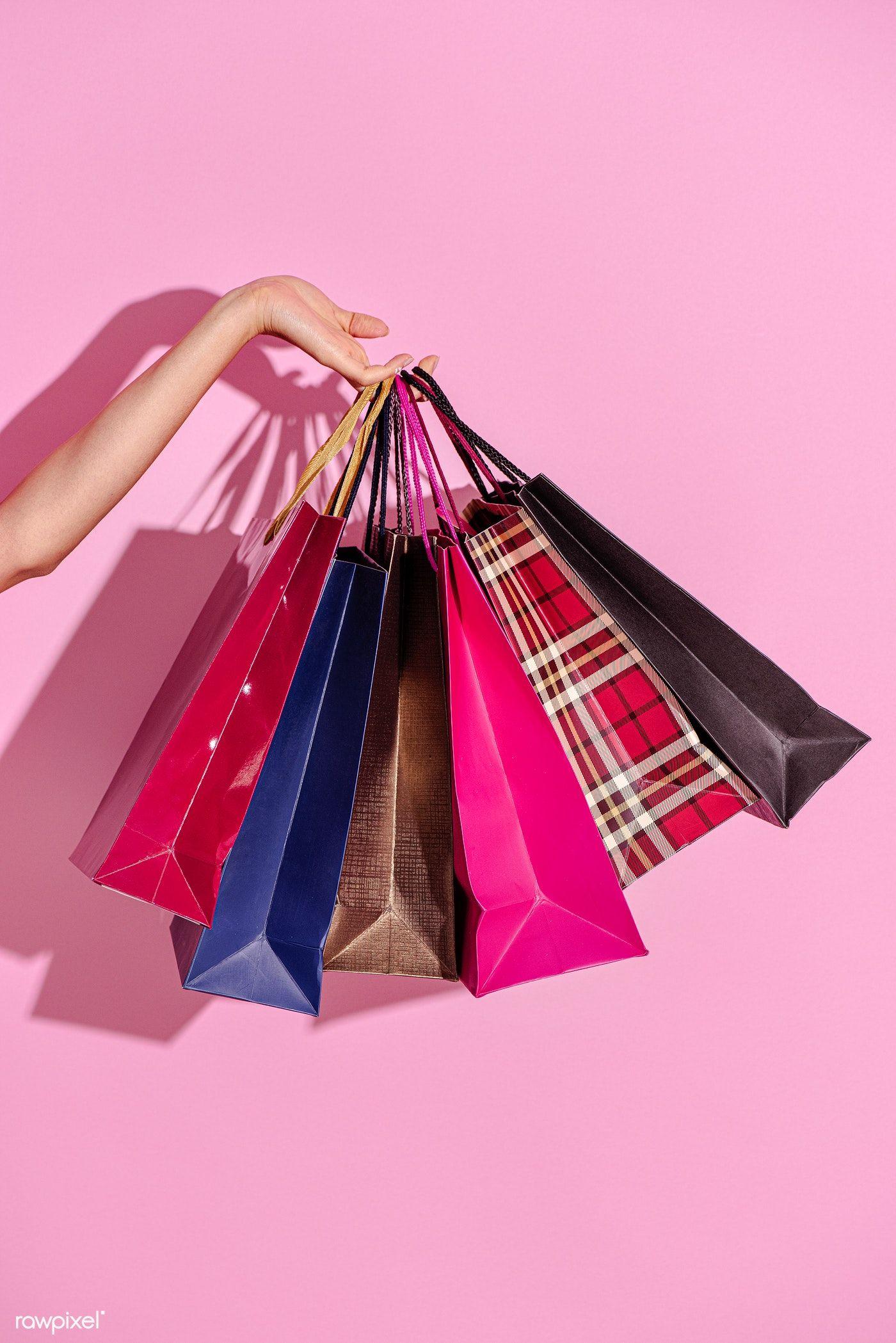 1400x2098 Download premium image of Woman carrying shopping bags against a pink. Pink background, Fashion wall art, Logo online shop