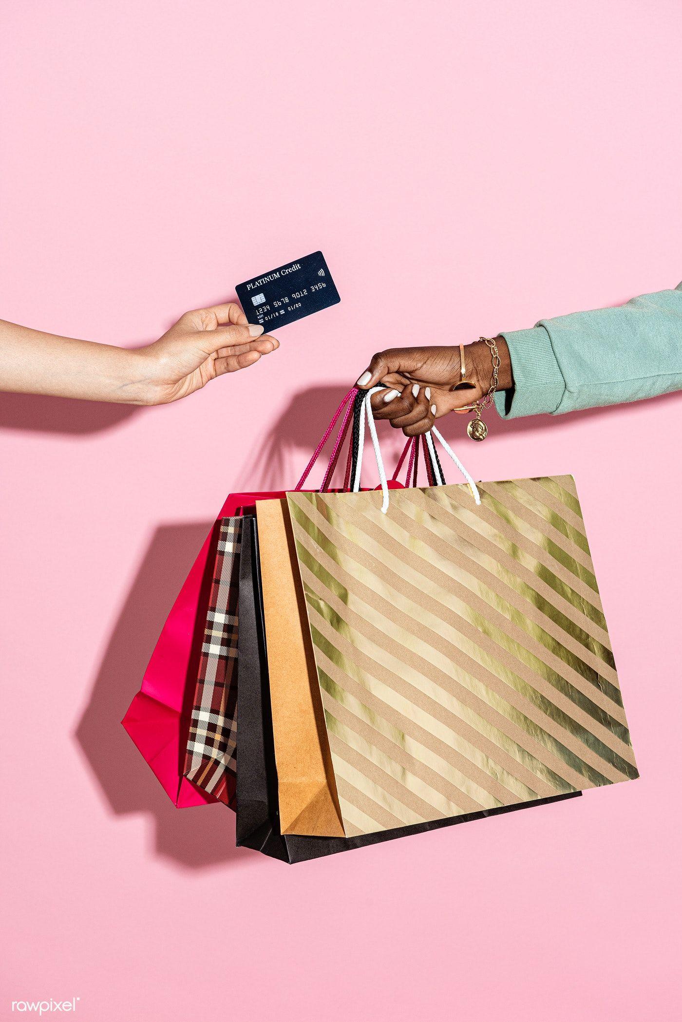 1400x2098 Download premium image of Woman with shopping bags and a credit card against a pink background by Teddy about shopping, shopping bag, credit card, money, and ho. Pink background, Credit card