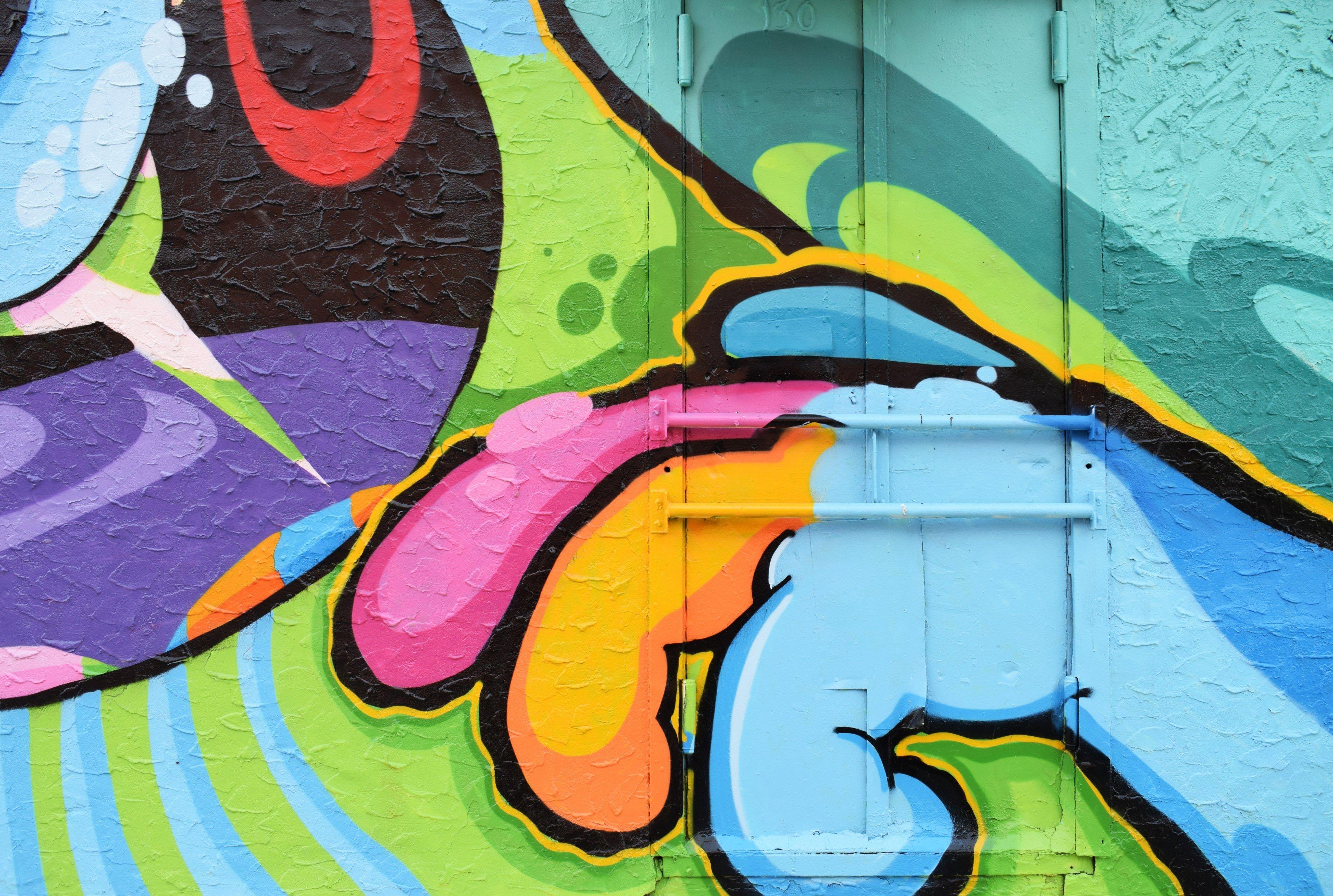 3840x2581 brightly colored urban street art graffiti of cartoon monster mouth