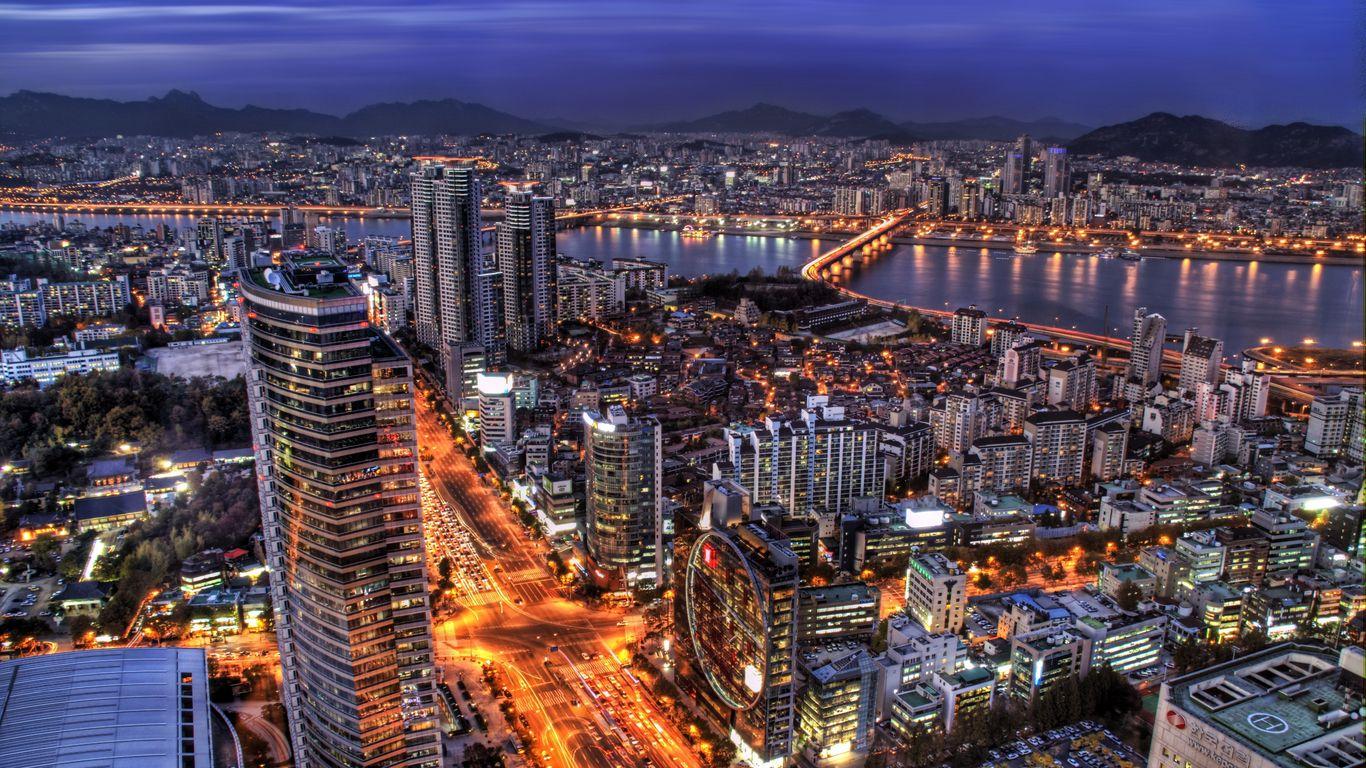 1366x768 Download wallpaper 1366x768 south korea, seoul, capital city, evening, skyscrapers, lights, blue, sky, hdr tablet, laptop HD background