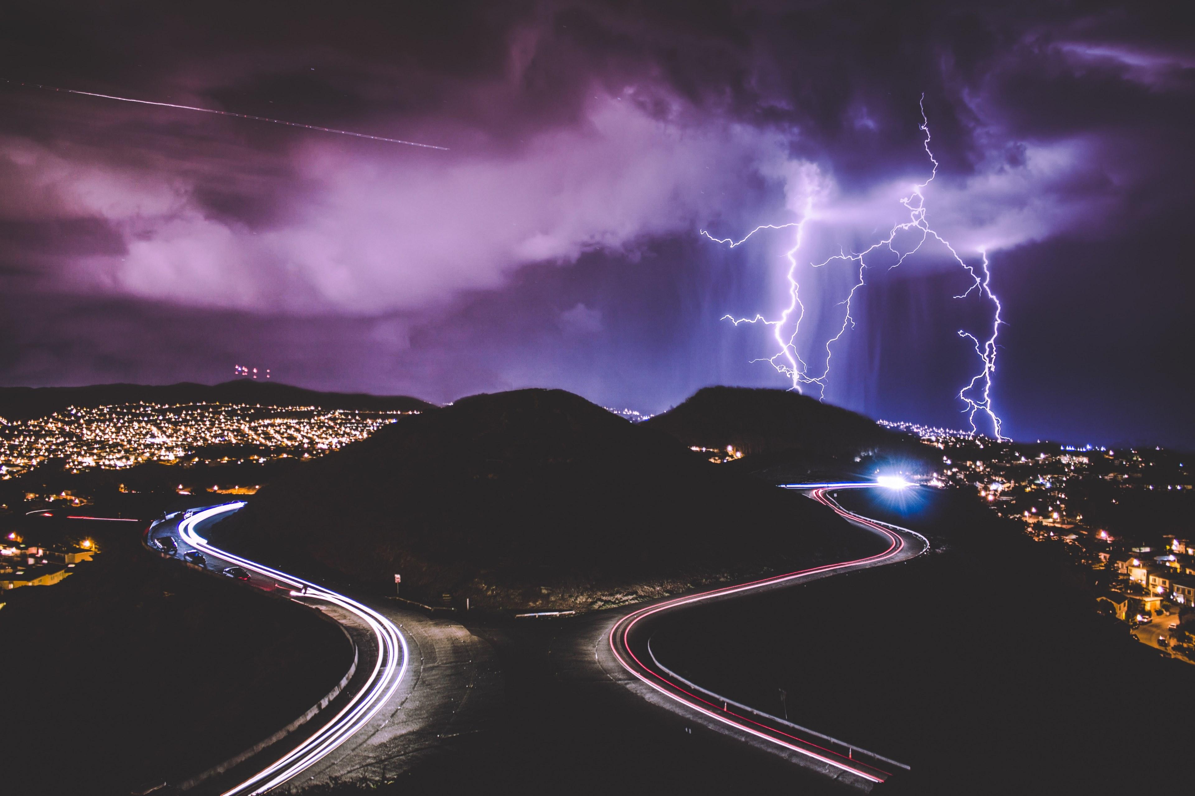 3840x2560 Wallpaper / an exuberating look at purple lightning shooting down from a cloud into the city of twin peaks, an electricity storm in twin peaks 4k wallpaper