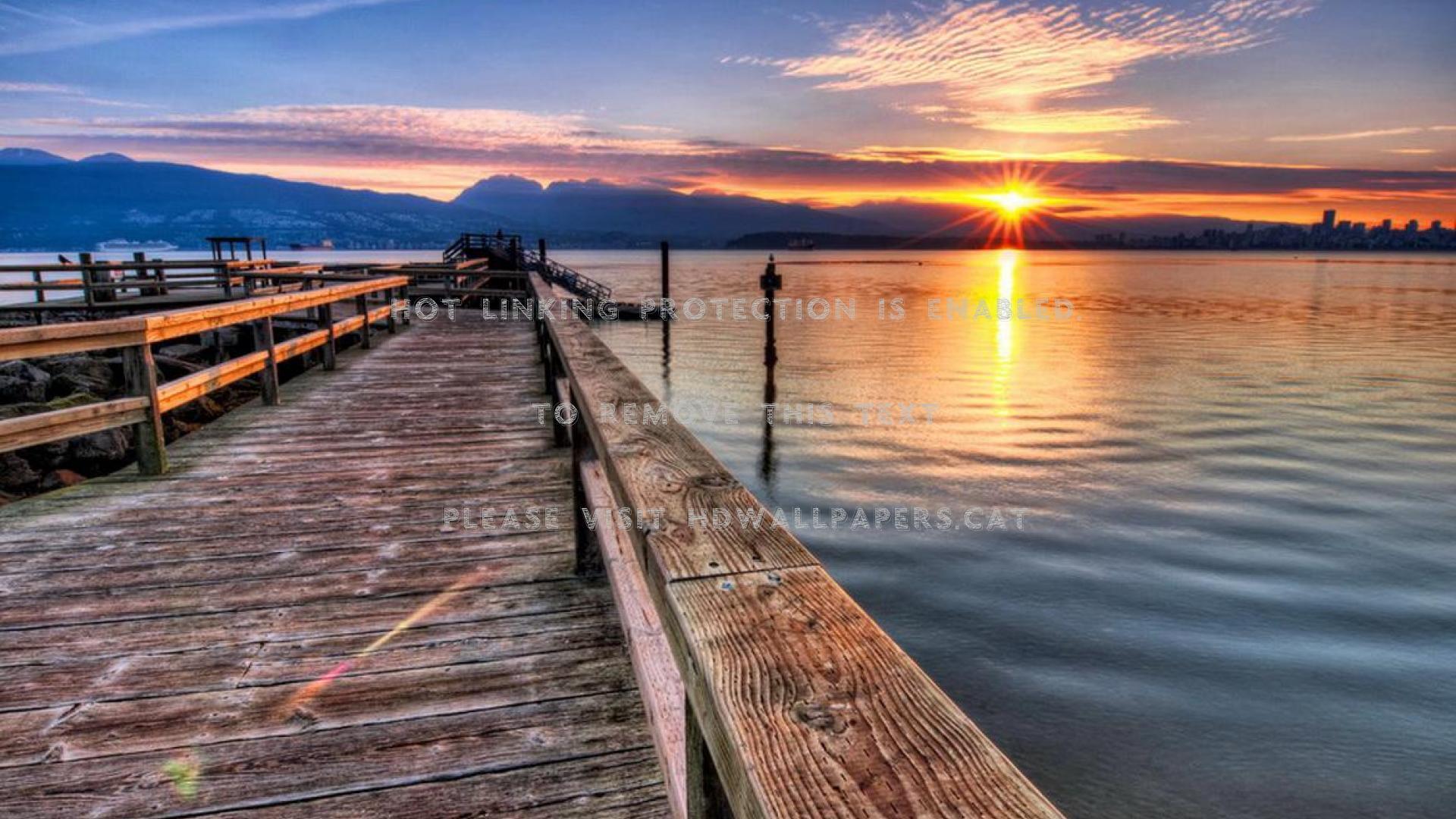 1920x1080 a boardwalk on lake at sunset hdr rays