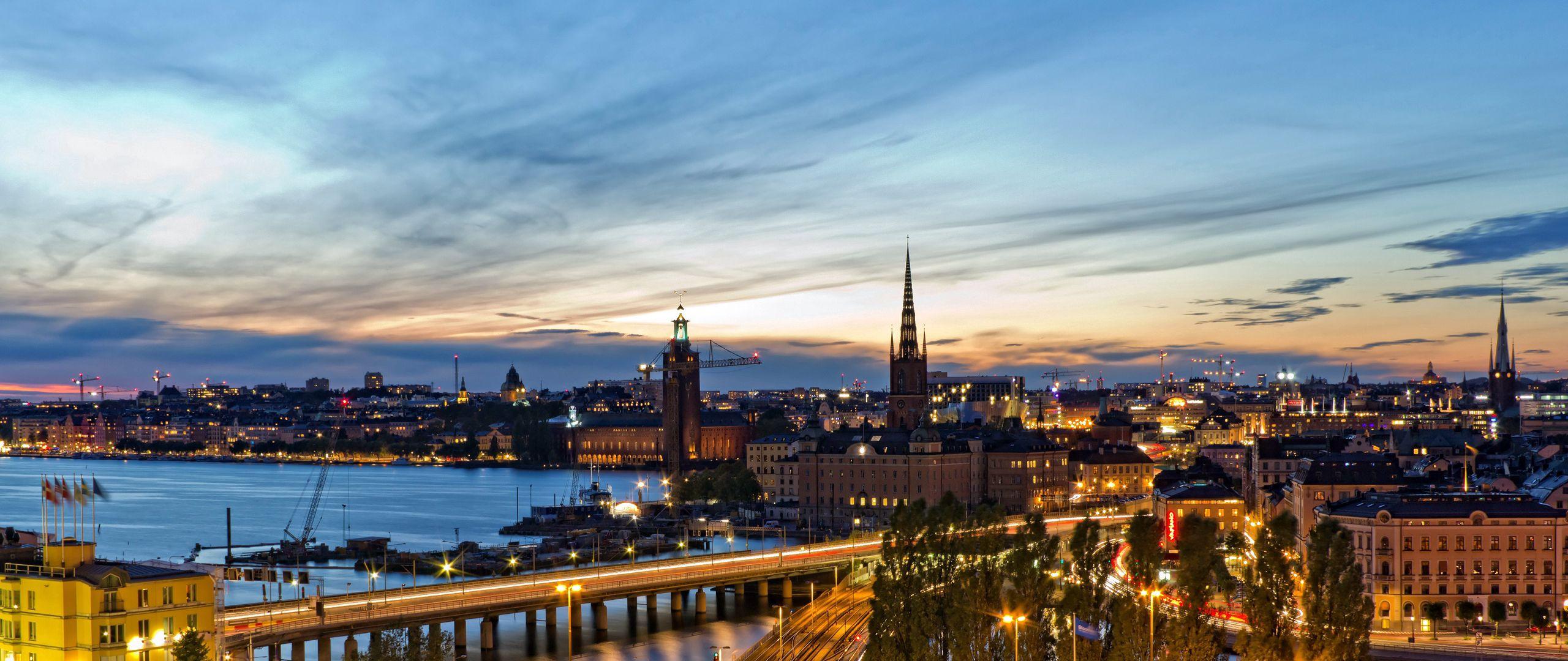 2560x1080 Download wallpaper 2560x1080 stockholm, sweden, evening, lights of the city dual wide 1080p HD background
