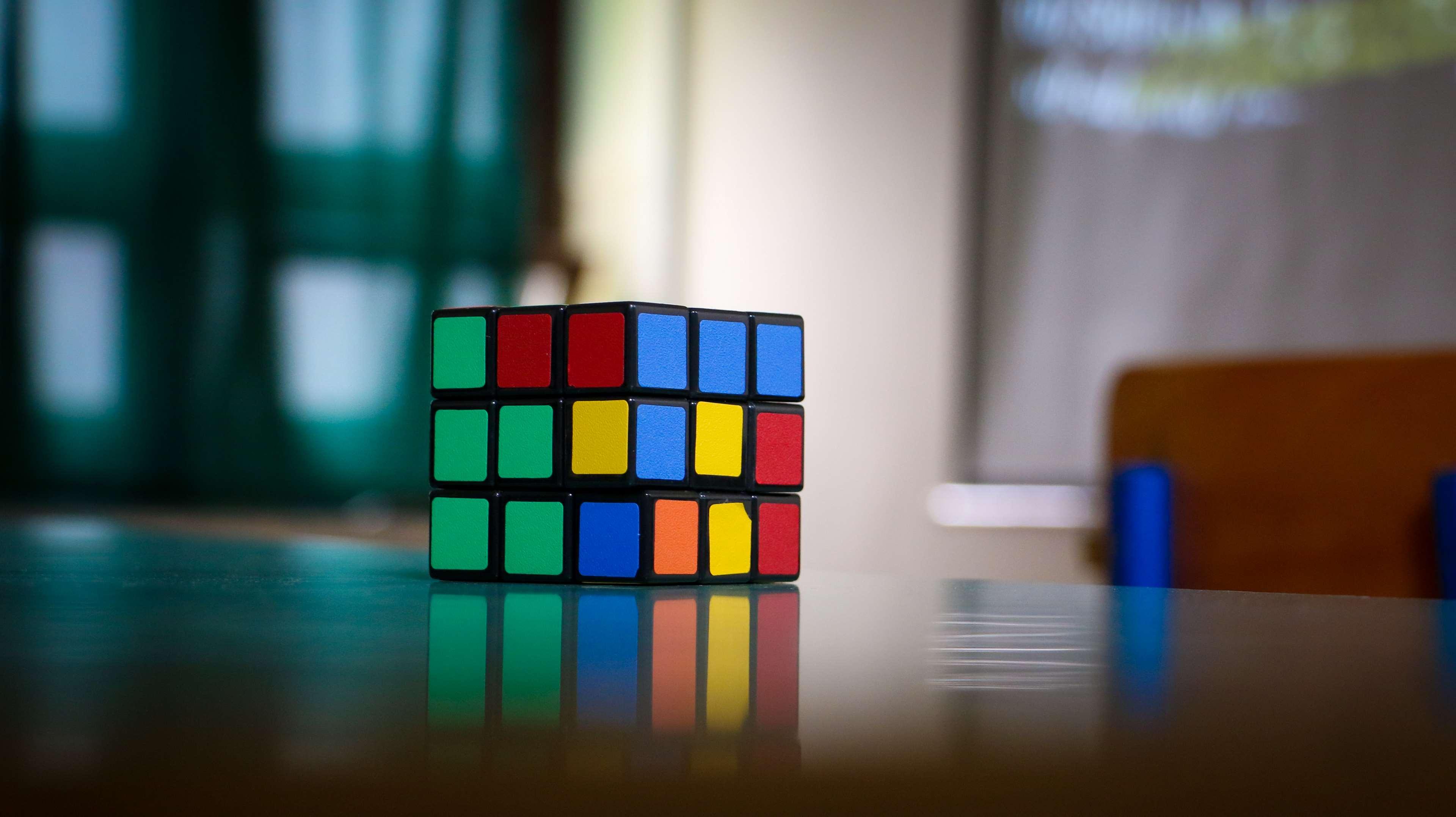 3840x2156 colorful, cube, object, puzzle, rubik, rubiks cube, table 4k wallpaper