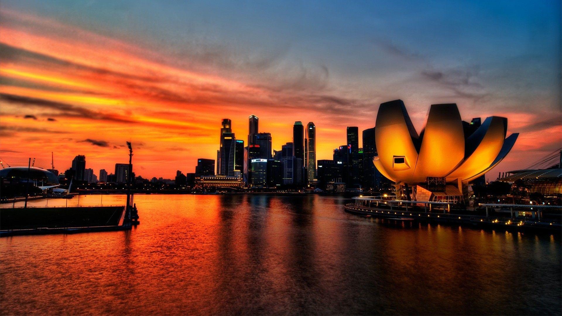 1920x1080 Futuristic city at sunset HD Desktop Wallpaper. HD Desktop Wallpaper