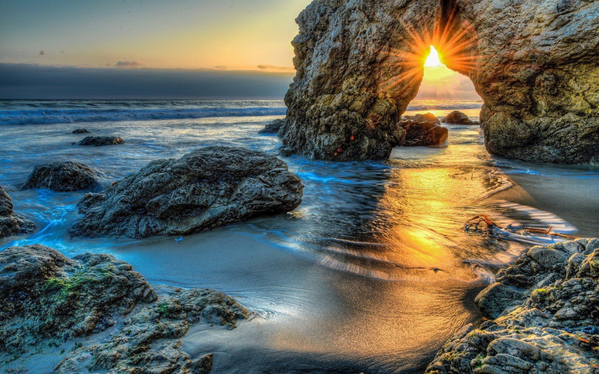 1920x1200 Download wallpaper storm, coast, malibu, ocean, dawn, rock, wave, sun, pacific ocean for desktop with resolution 1920x1200. High Quality HD picture wallpaper