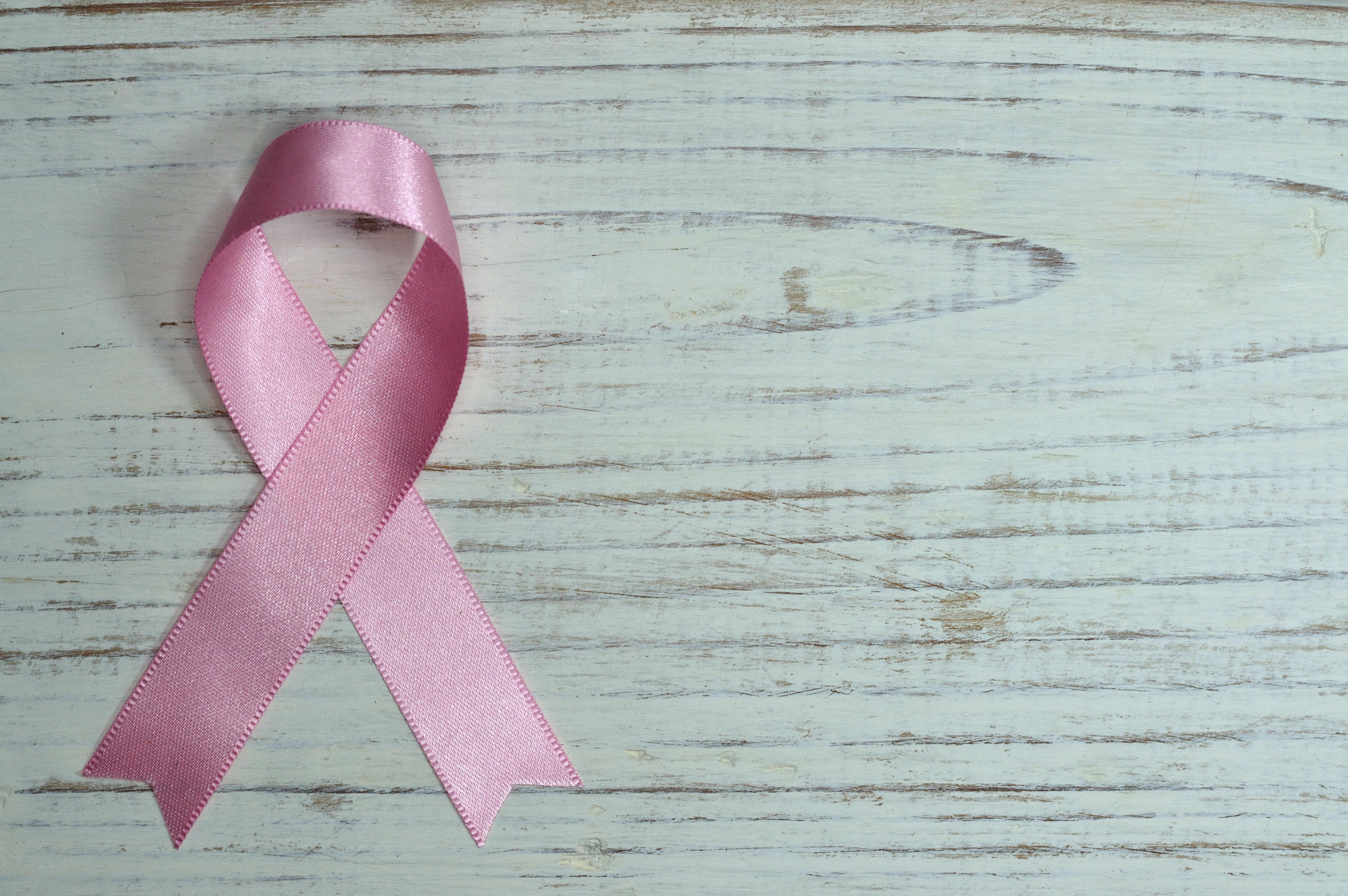 6016x4000 Breast Cancer Awareness on Teal Wooden Surface · Free
