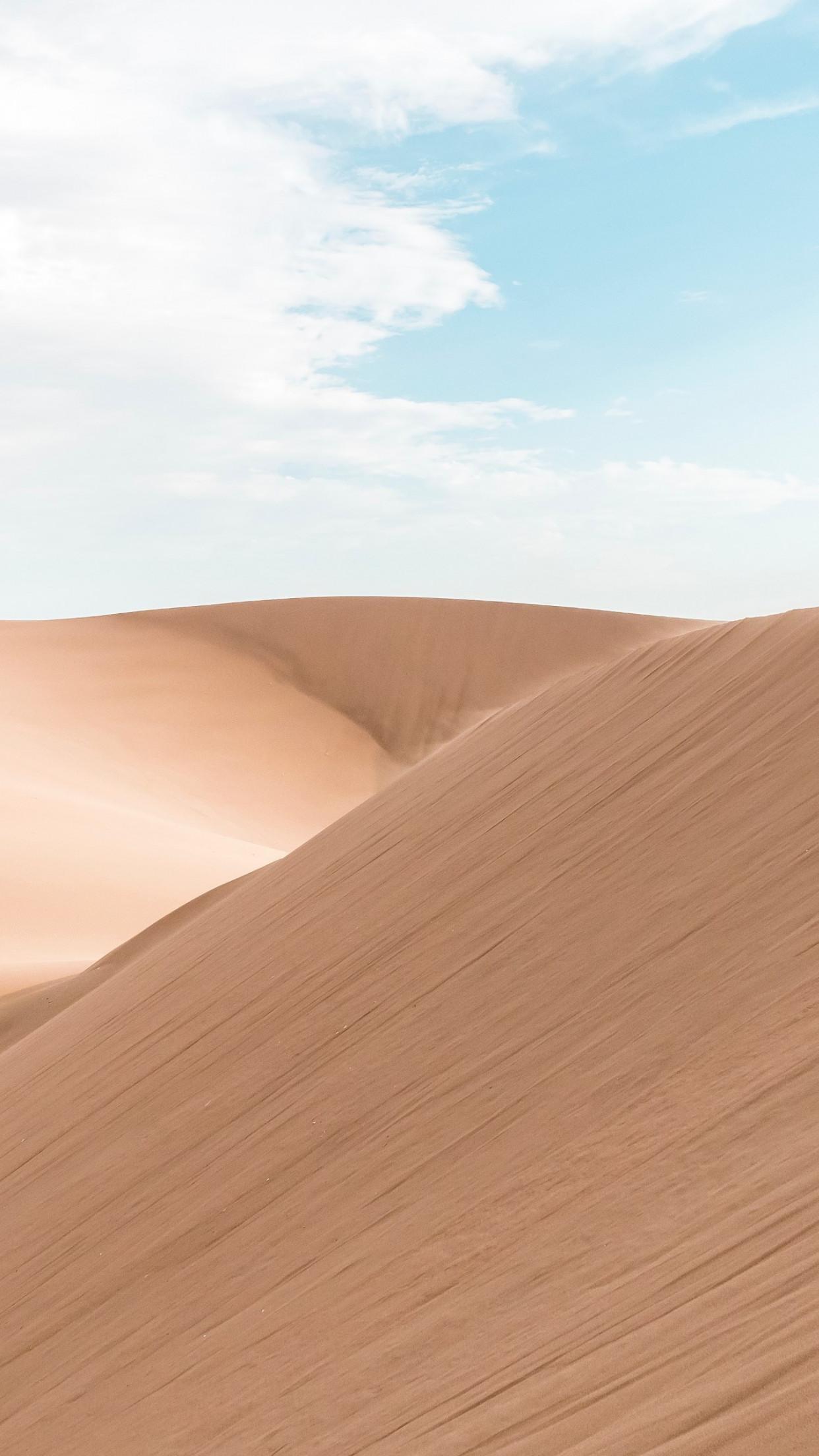 1242x2208 Download wallpaper: On the sand dunes from Huacachina, Peru 1242x2208