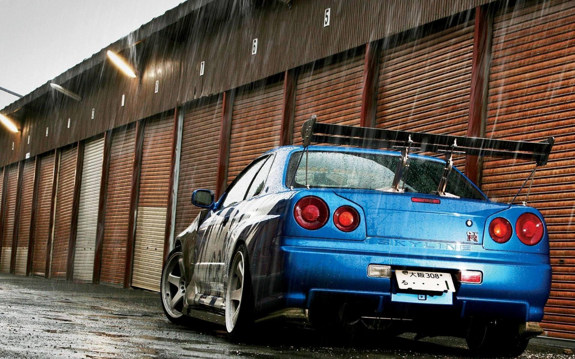 1920x1200 Blue Nissan Skyline GTR R34 in the rain Desktop wallpaper 1600x900