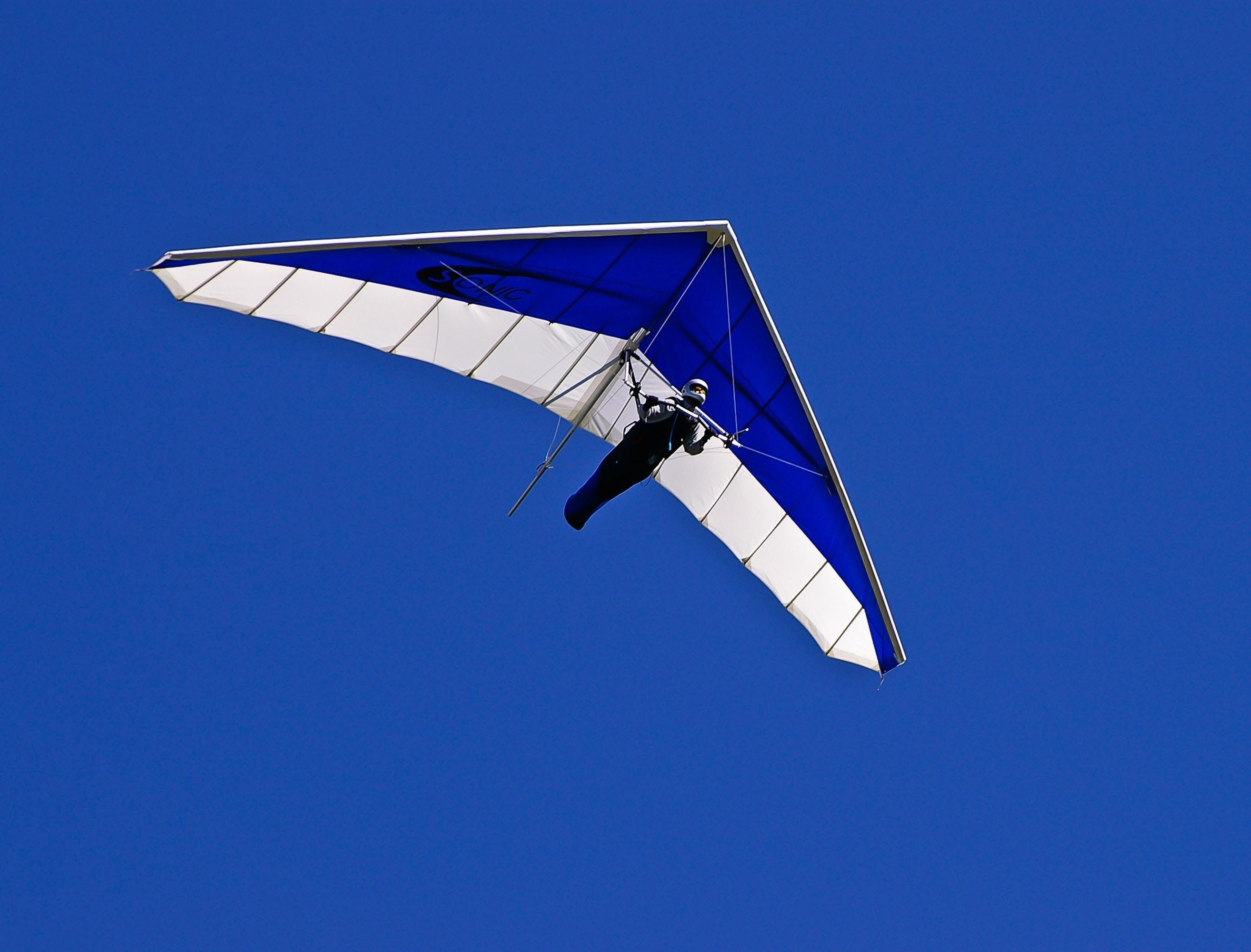 2627x2000 Man on Blue and White Air Glider · Free