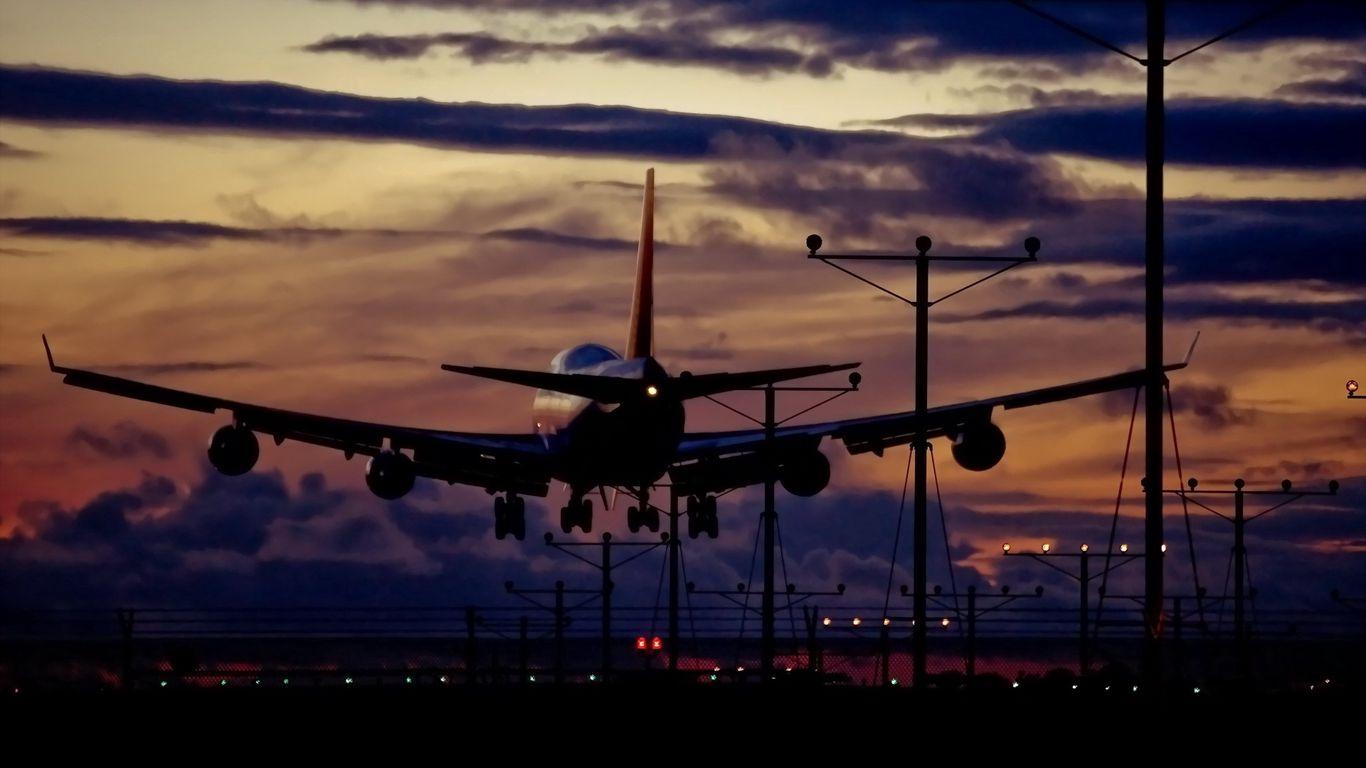 1366x768 Download wallpaper 1366x768 plane, taking off, night, light tablet, laptop HD background