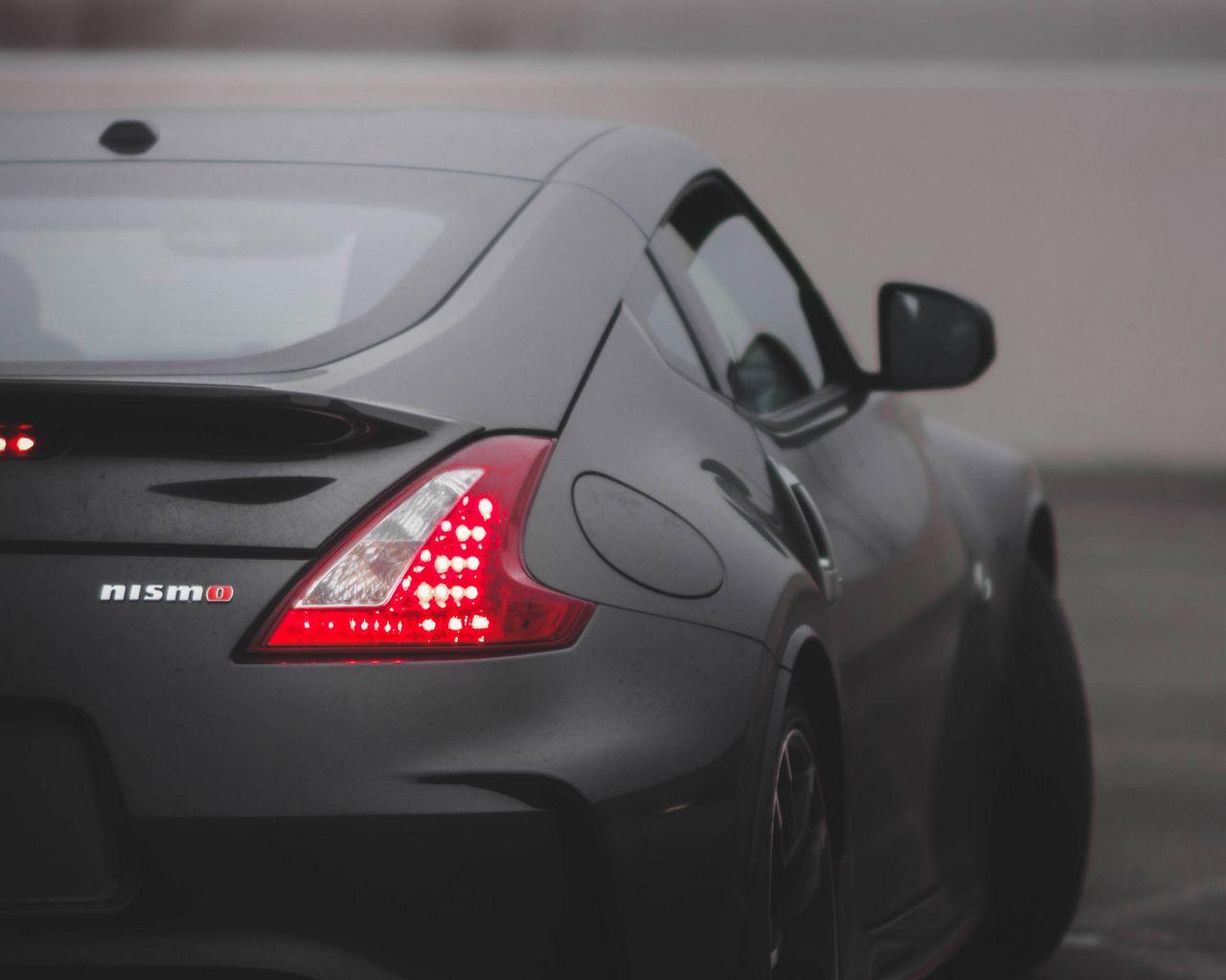 1280x1024 Download wallpaper 1280x1024 nissan nismo, car, sports car, gray, rear view standard 5:4 HD background