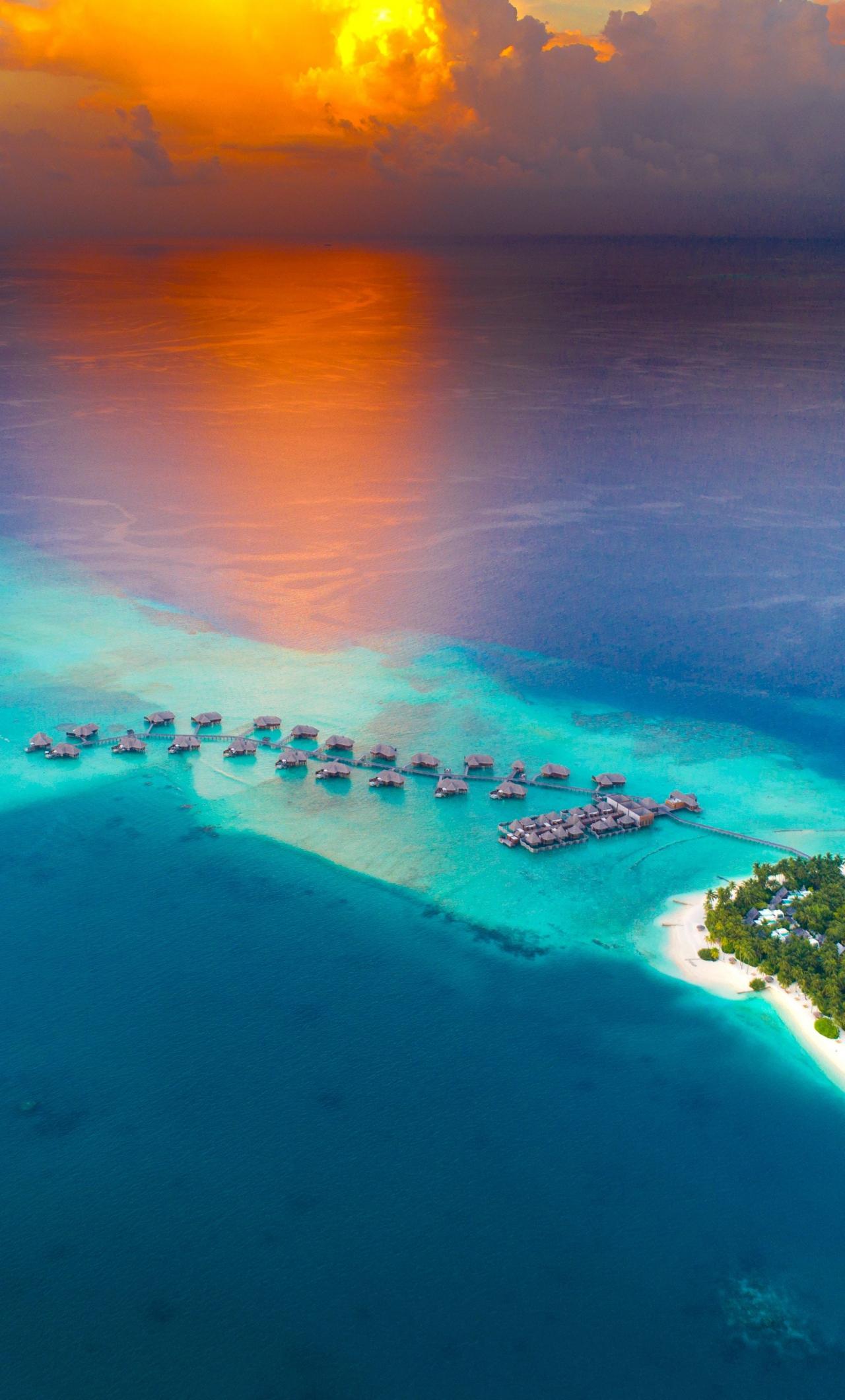 1280x2120 Download 1280x2120 wallpaper sunset, aerial view, tropical island, resort, huts, iphone 6 plus, 1280x2120 HD image, background, 21542