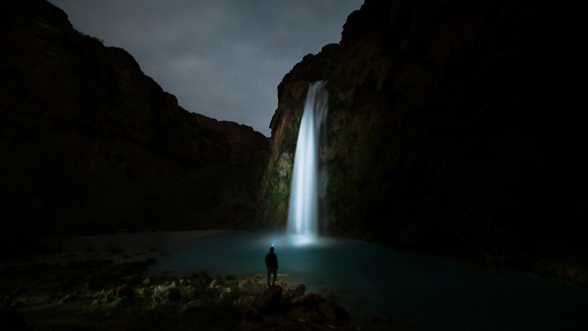 1920x1080 Man Enjoying Waterfall Nature View At Night E Shab Quotes