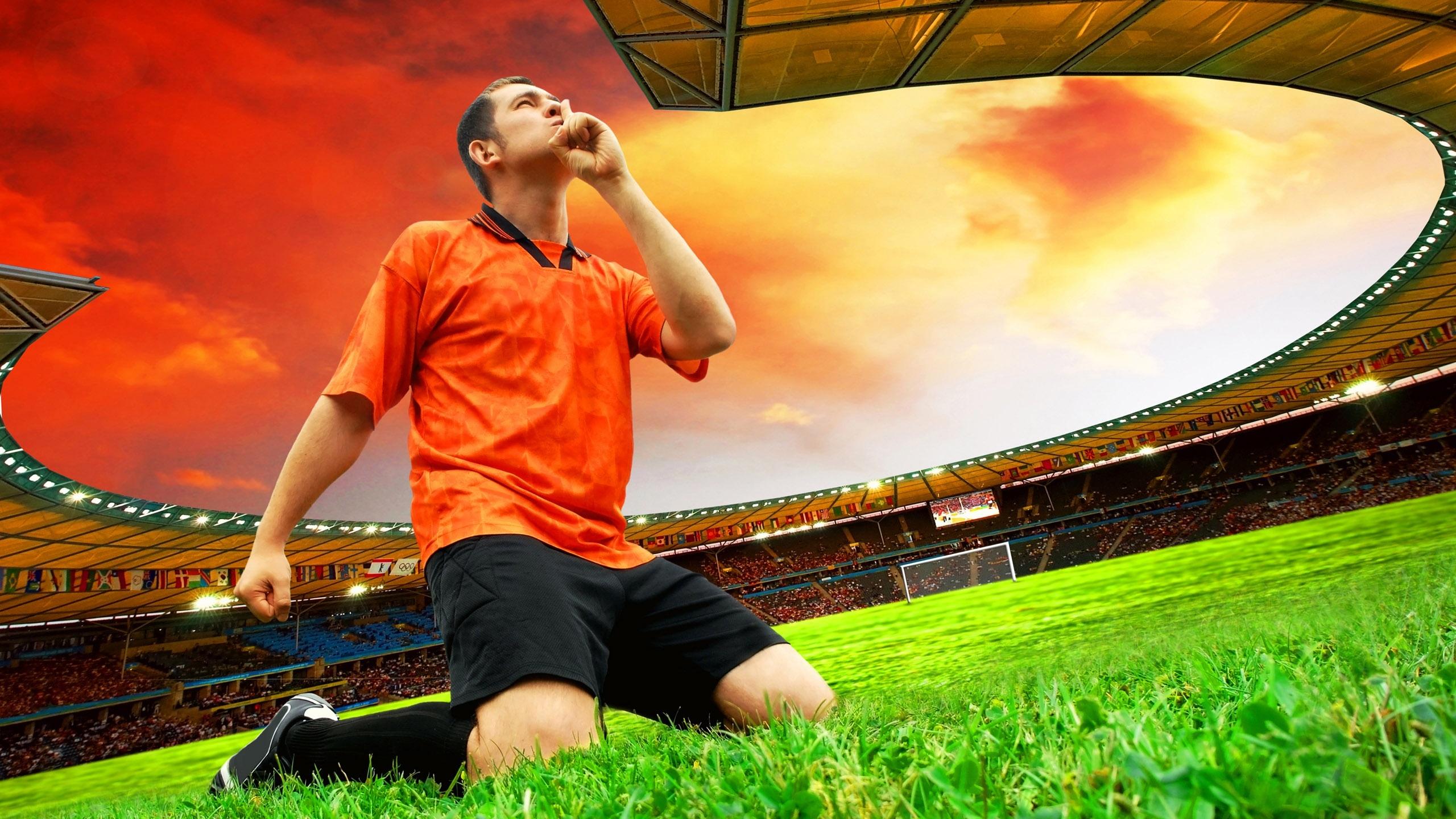 2560x1440 Football player thanks desktop PC and Mac wallpaper