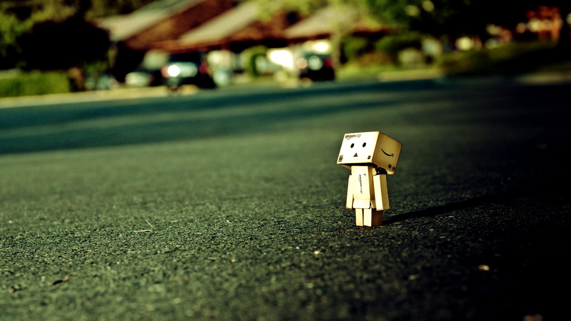 1920x1080 Download Wallpaper 1920x1080 danboard, road, cardboard robot, evening Full HD 1080p HD Background