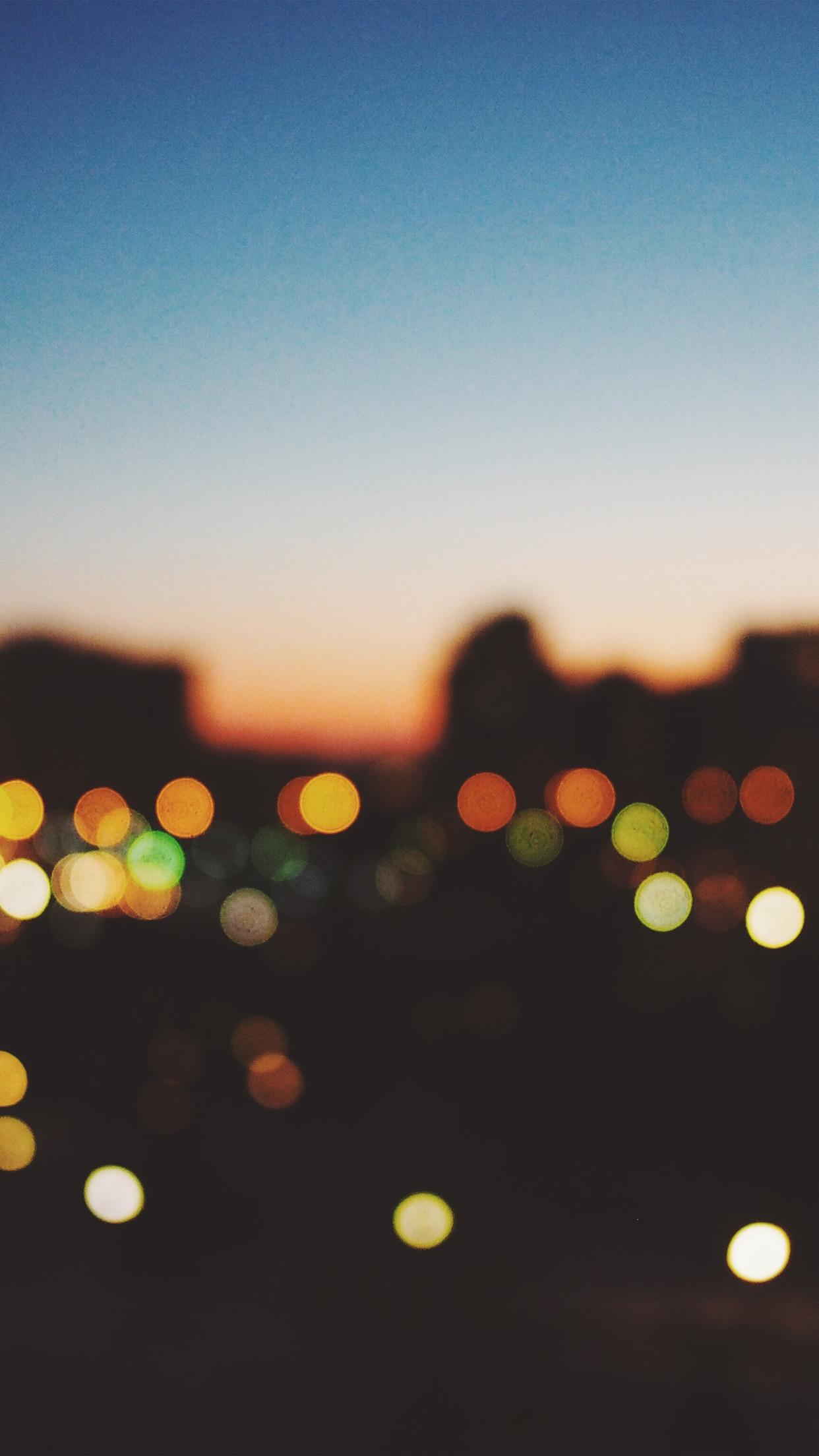 1242x2208 iPhone X wallpaper. light bokeh sunset city