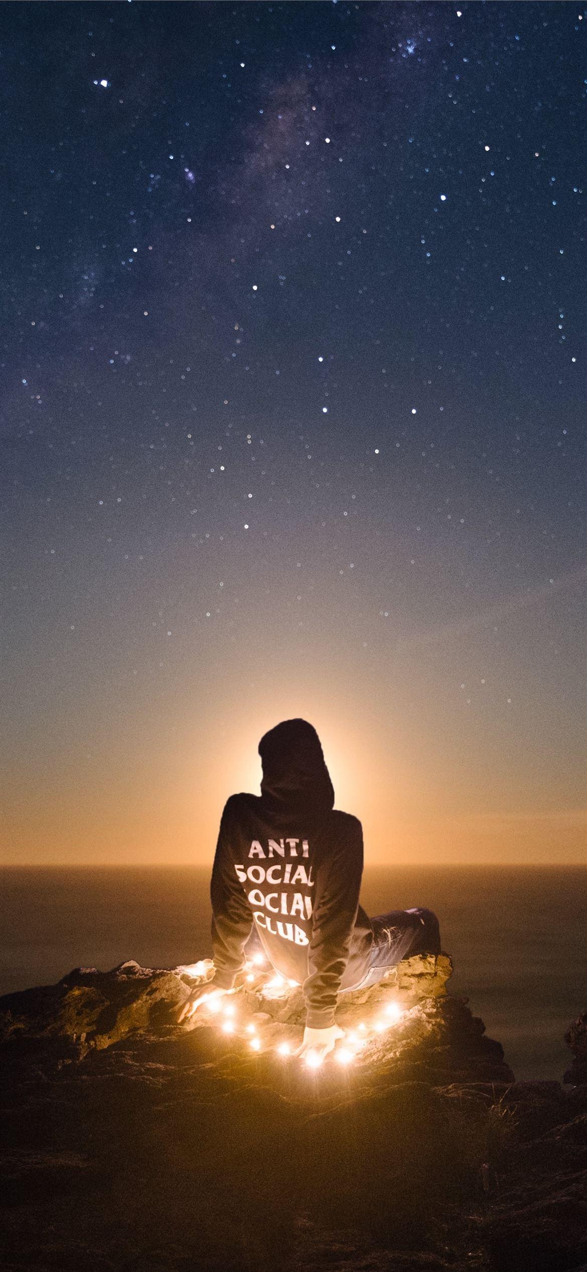 1170x2532 person wearing black anti social social club hoodi. iPhone 12 Wallpaper Free Download
