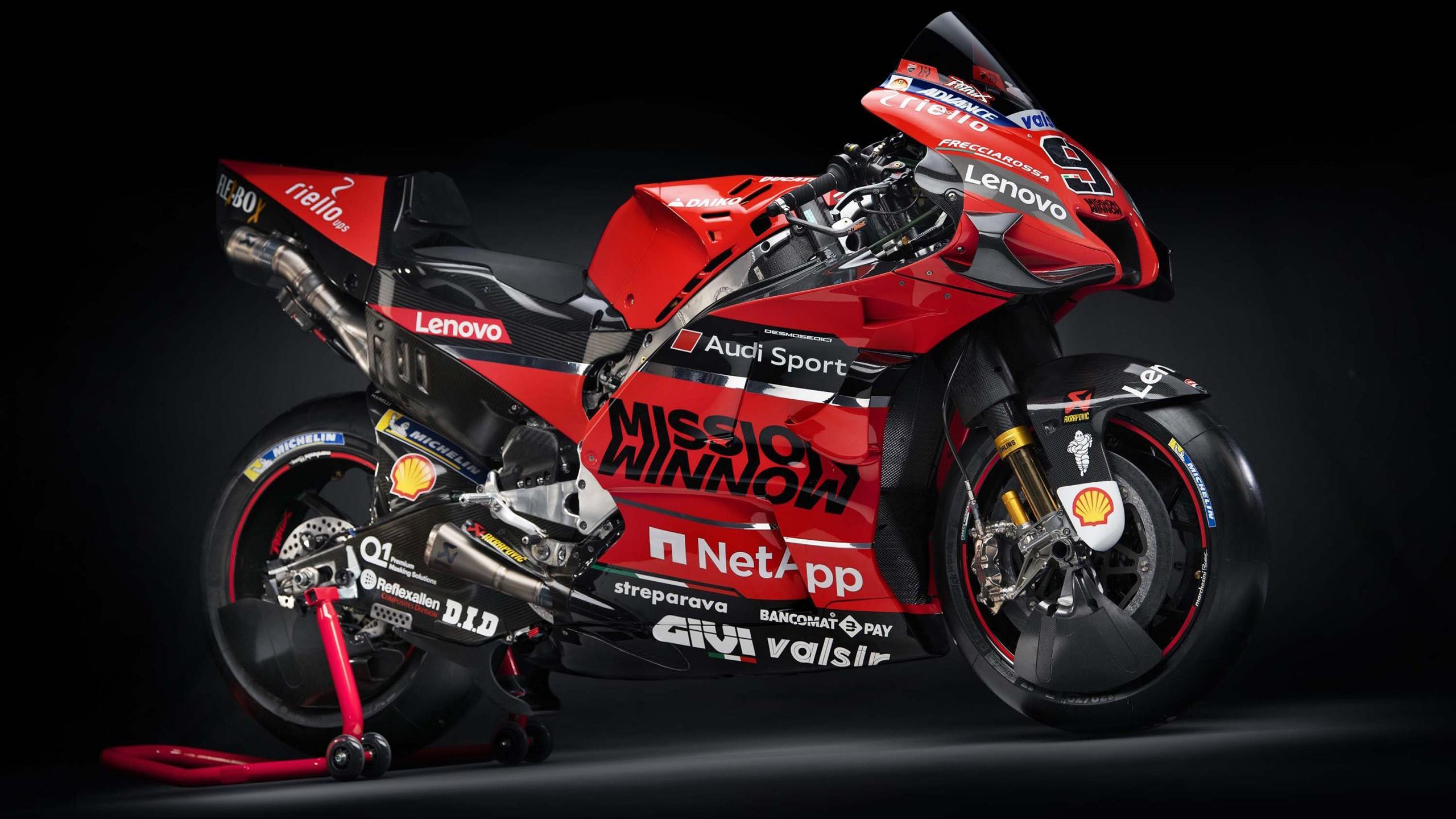 2560x1440 Red motorcycle Ducati Desmosedici GP20 2020 on a gray background wallpaper and image, picture, photo