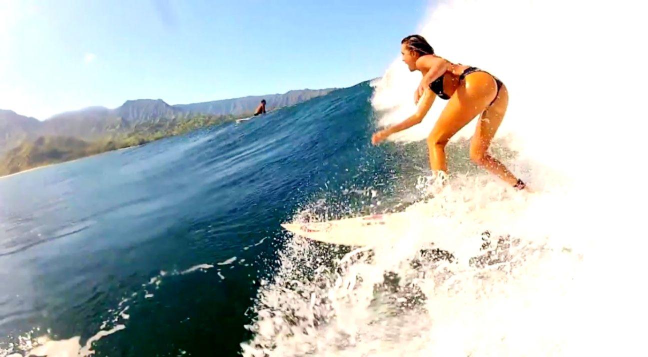 1297x714 Surfing Girl Wallpaper