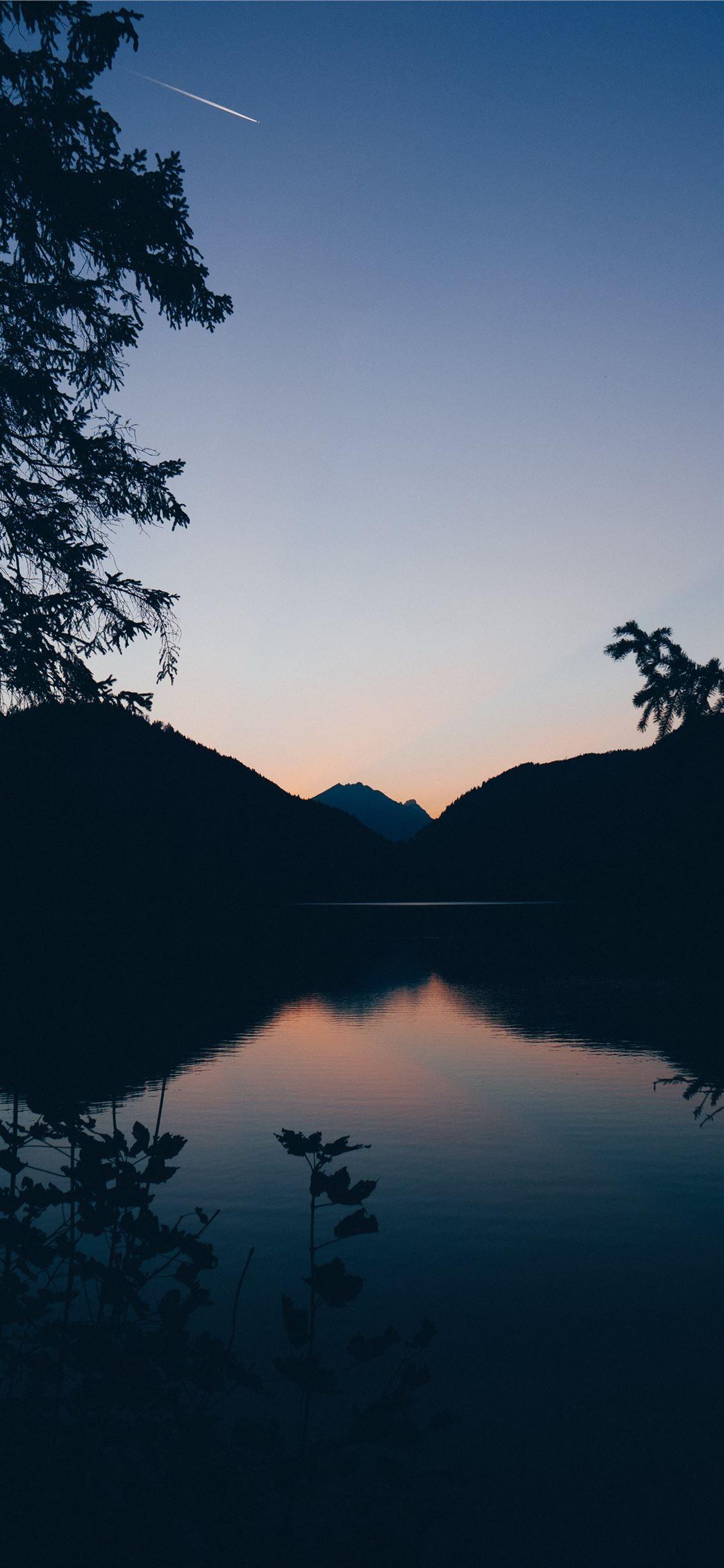 1125x2436 silhouette of mountain lake and trees in nature ph. iPhone 11 Wallpaper Free Download