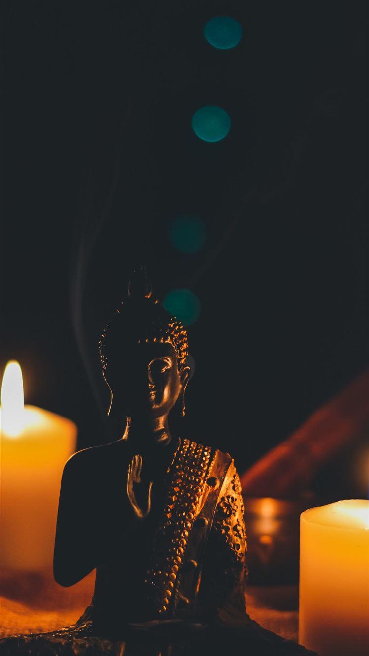 750x1334 buddha figurine candles buddhism harmony HD backgr. iPhone Wallpaper Free Download