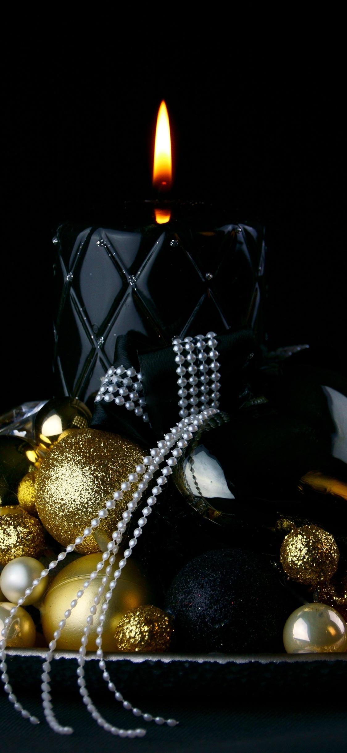 1125x2436 Christmas balls, candle, flame iPhone X 3GS wallpaper download