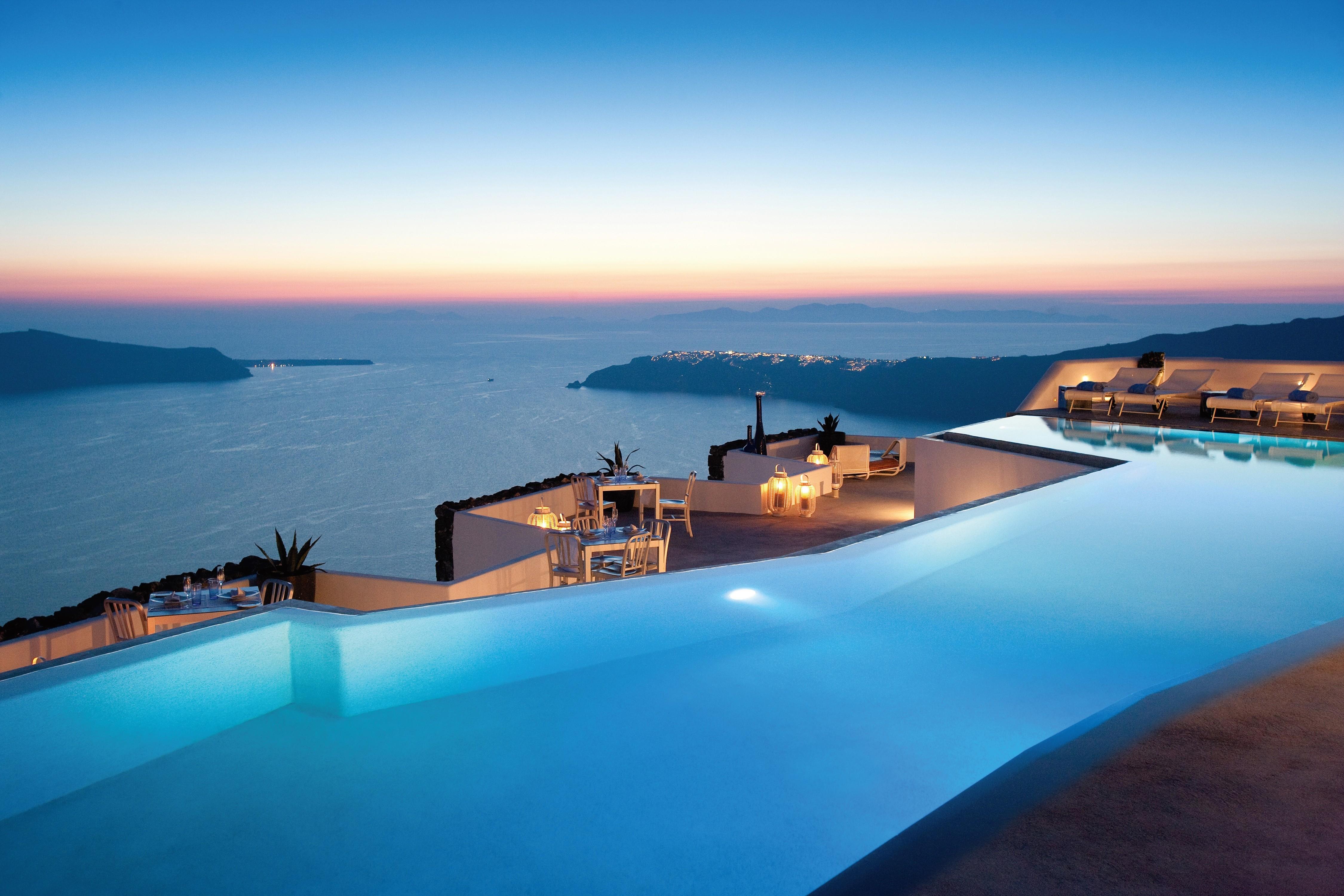 4500x3000 swimming pool santorini greece island sea hotel landscape sunset evening lights clear sky restaurant horizon wallpaper