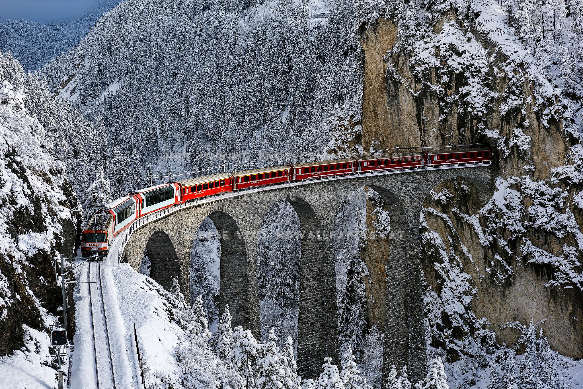 2048x1367 train switzerland snow winter bridge nature