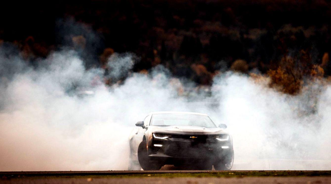 1339x745 Drifting Car Smoke Wallpaper