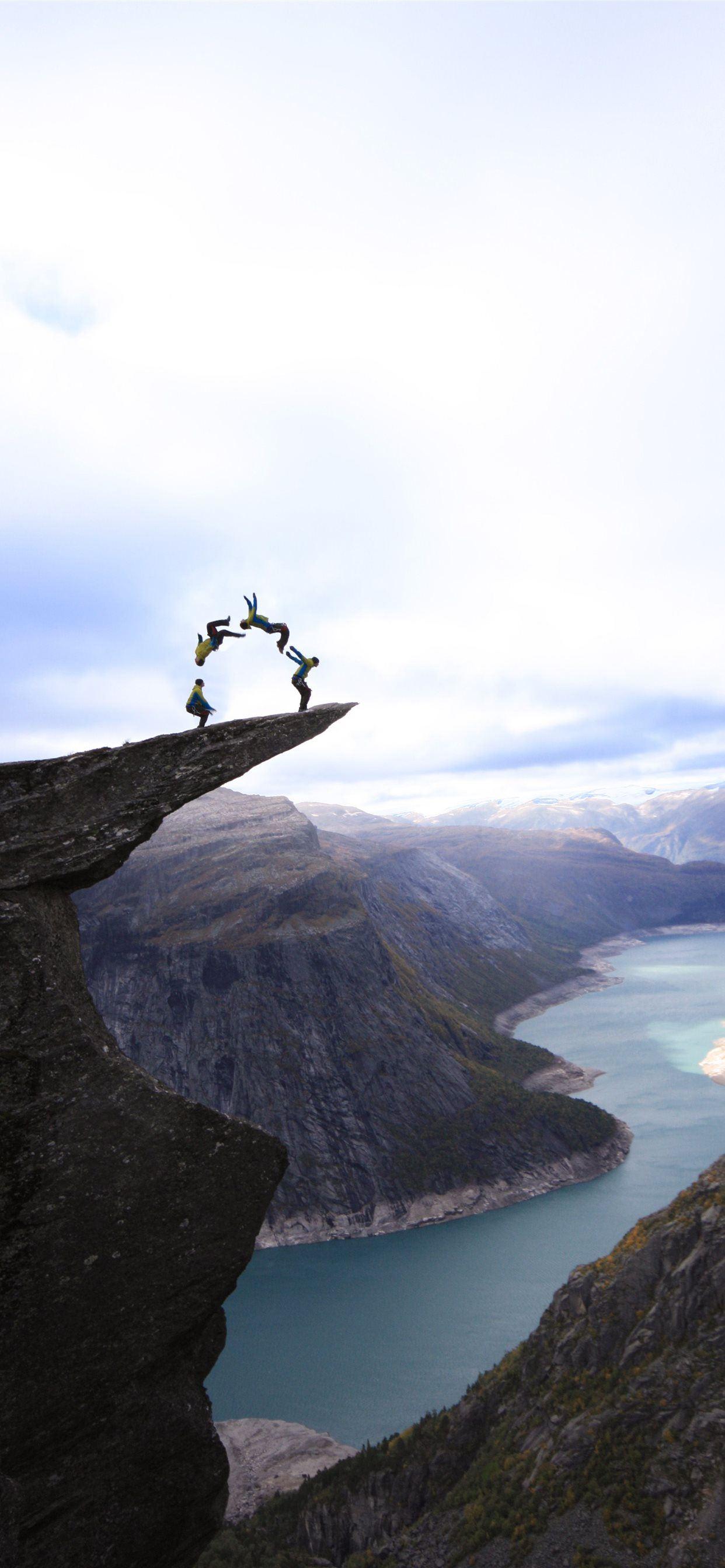 1242x2688 A photohop of a real jump on Trolltunga Norway iPhone 11 Wallpaper Free Download